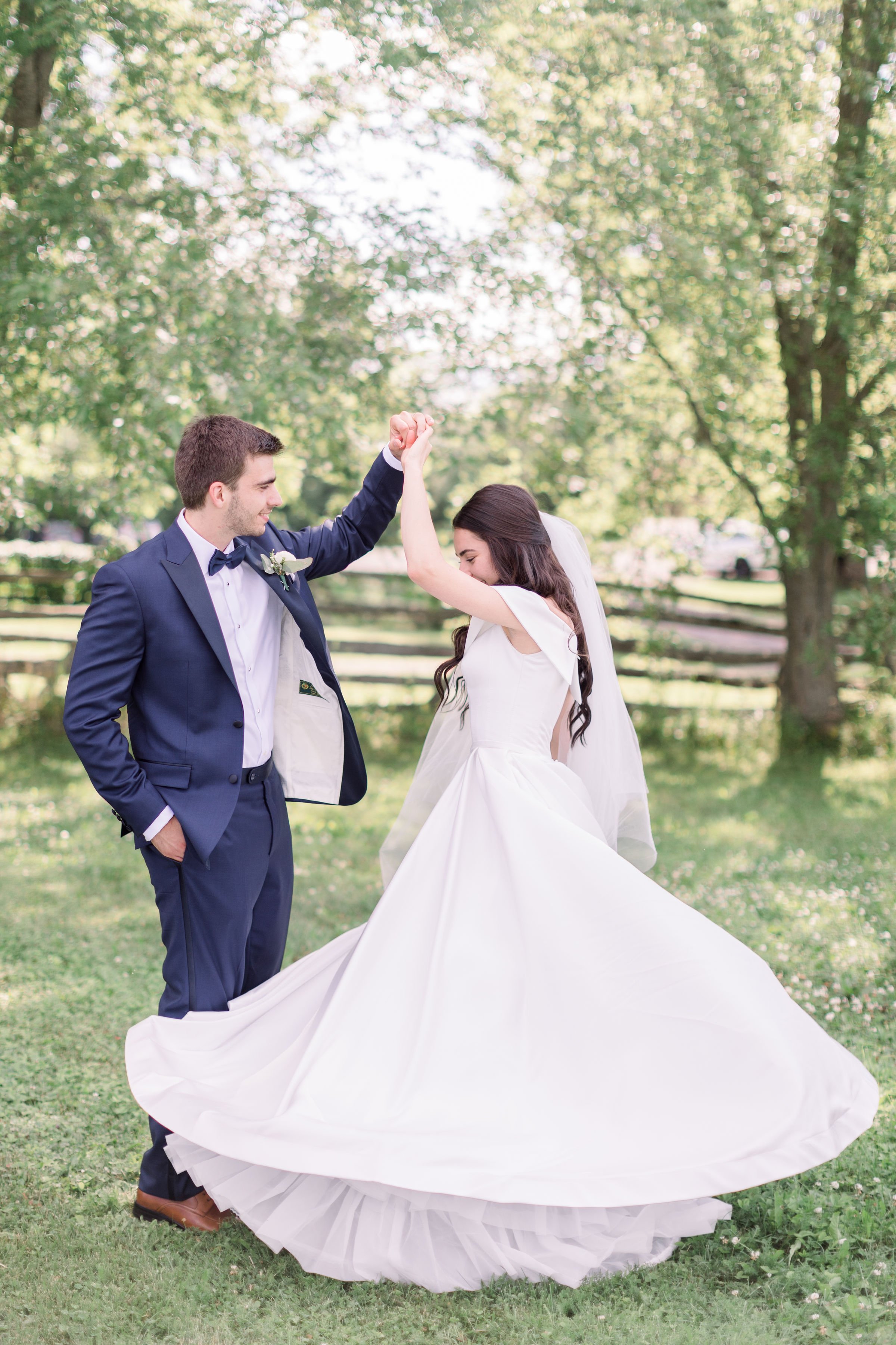  The groom twirls his bride on their wedding day by Chelsea Mason Photography an Ontario wedding photographer. Ontario wedding #Chelseamasonphotography #Chelseamasonweddings #Onatarioweddings #EvermoreweddingsAlmonte #Ontarioweddingphotographers 