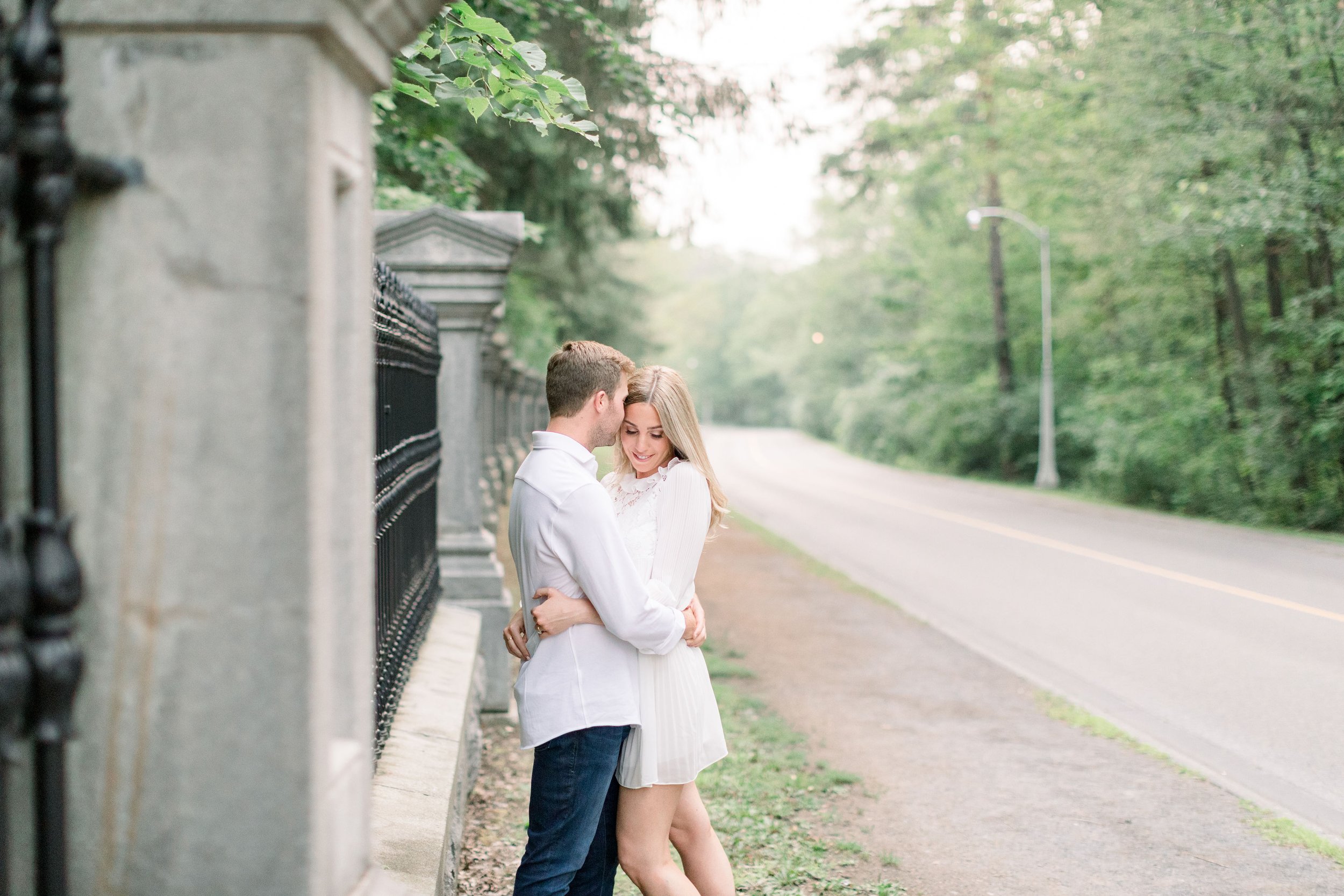  Professional engagement photographer Chelsea Mason Photography captures a man and woman snuggling. breathtaking engagements Ottawa #Ottawaengagements #Ottawaweddingphotographers #engagementwithdogs #ChelseaMasonPhotography #ChelseaMasonEngagements  