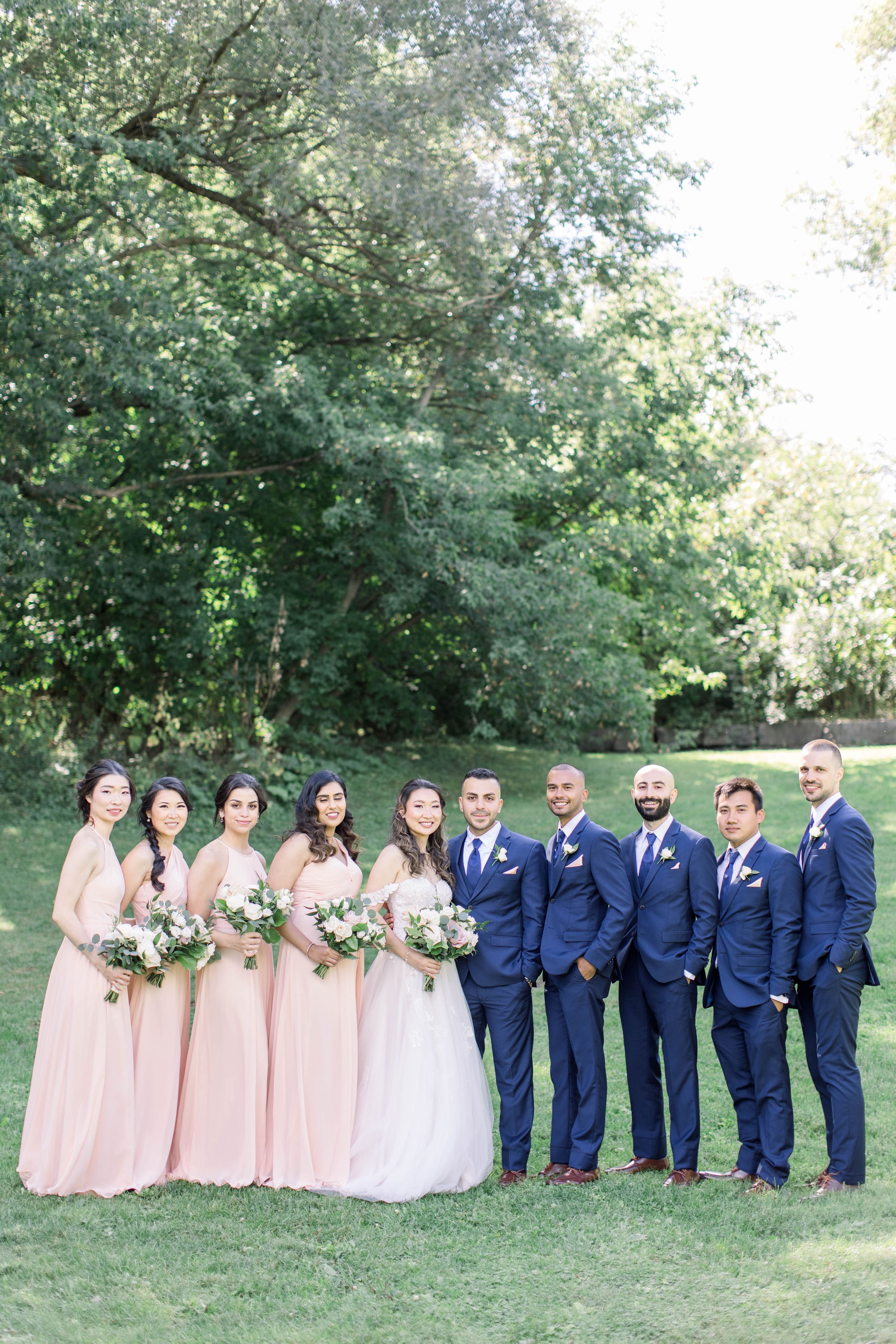  Chelsea Mason Photography captures a bridal party in light pink and blue in a green location in Ottawa. spring bridesmaid dress #ChelseaMasonPhotography #ChelseaMasonWeddings #DowntownOttawa #FairmontChateauLaurier #OttawaWeddings #OttawaPhotographe