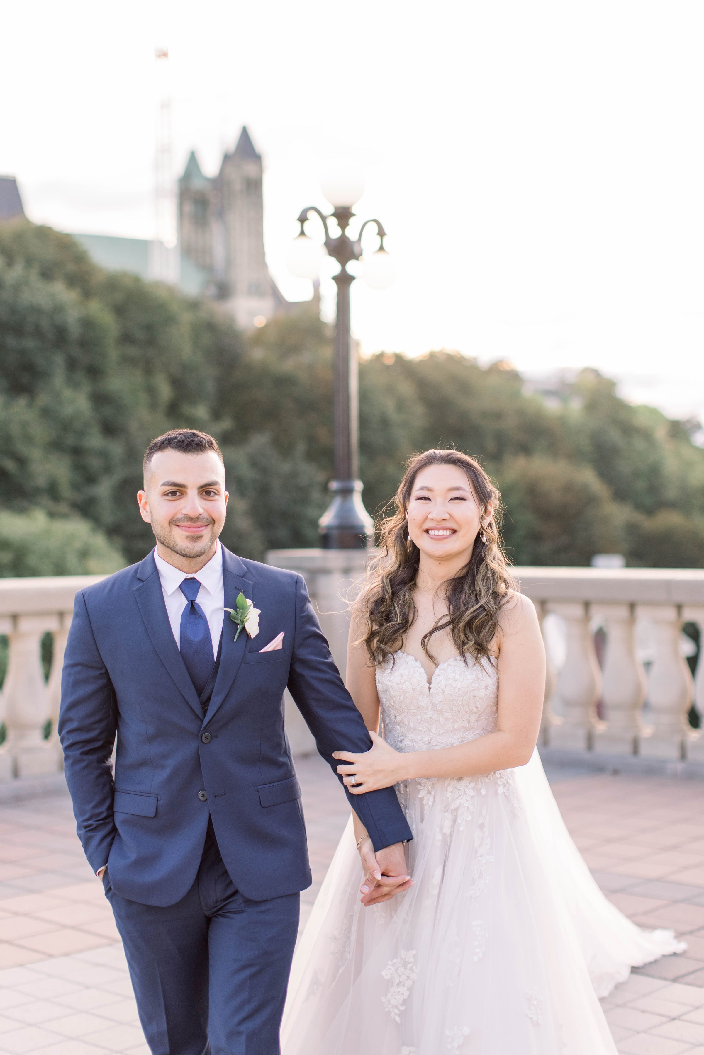  Portrait of a newlywed couple on a stone balcony captured by Chelsea Mason Photography. fairytale wedding just married #ChelseaMasonPhotography #ChelseaMasonWeddings #DowntownOttawa #FairmontChateauLaurier #OttawaWeddings #OttawaPhotographers 