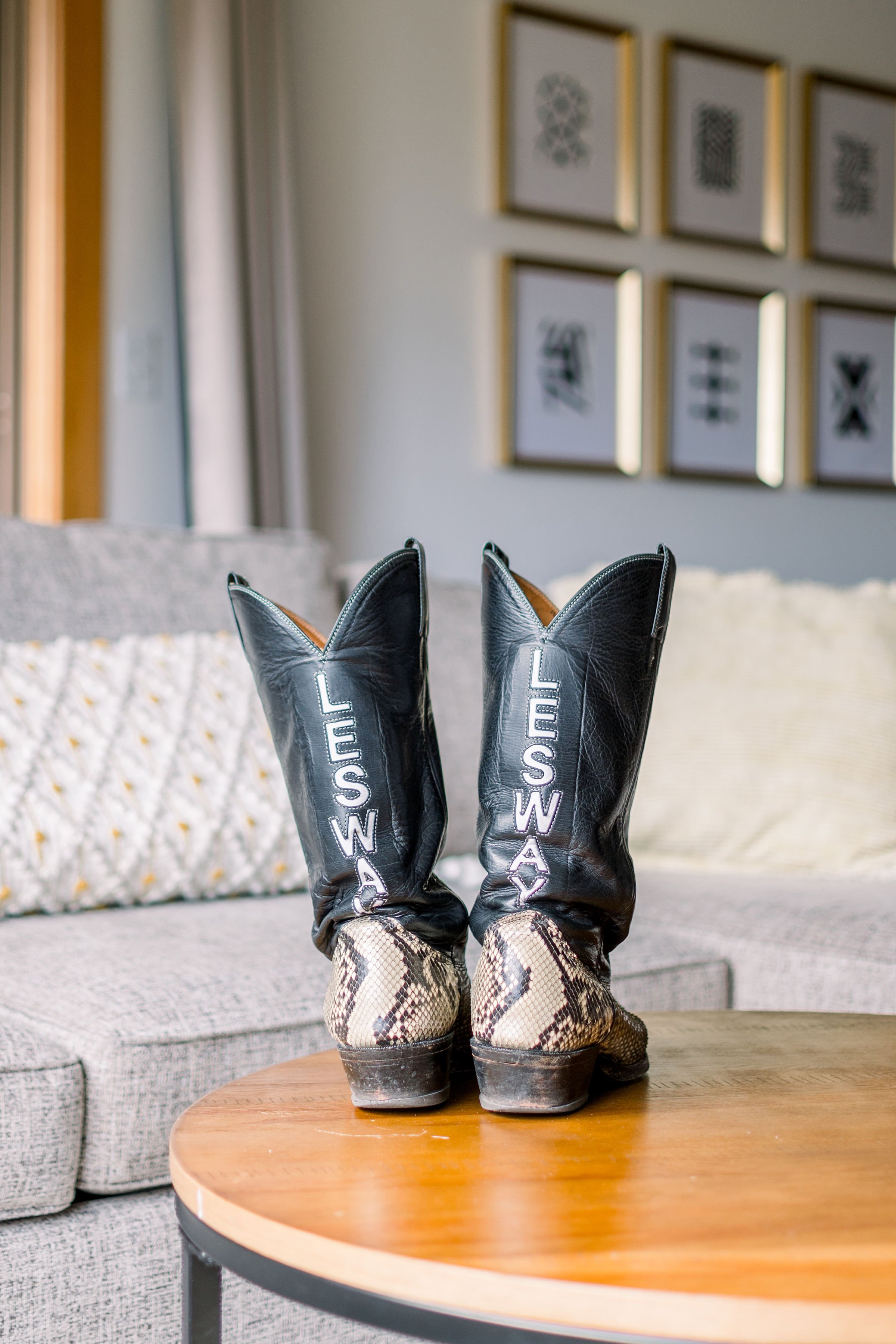  Grooms boots with his last name on the back of the boots by Chelsea Mason Photography. groom boots wedding cowboy boots #Albertaweddings #shesaidyes #Albertaweddingphotographers #SilvertipGolfCourse #ChelseaMasonPhotography #ChelseaMasonWeddings  
