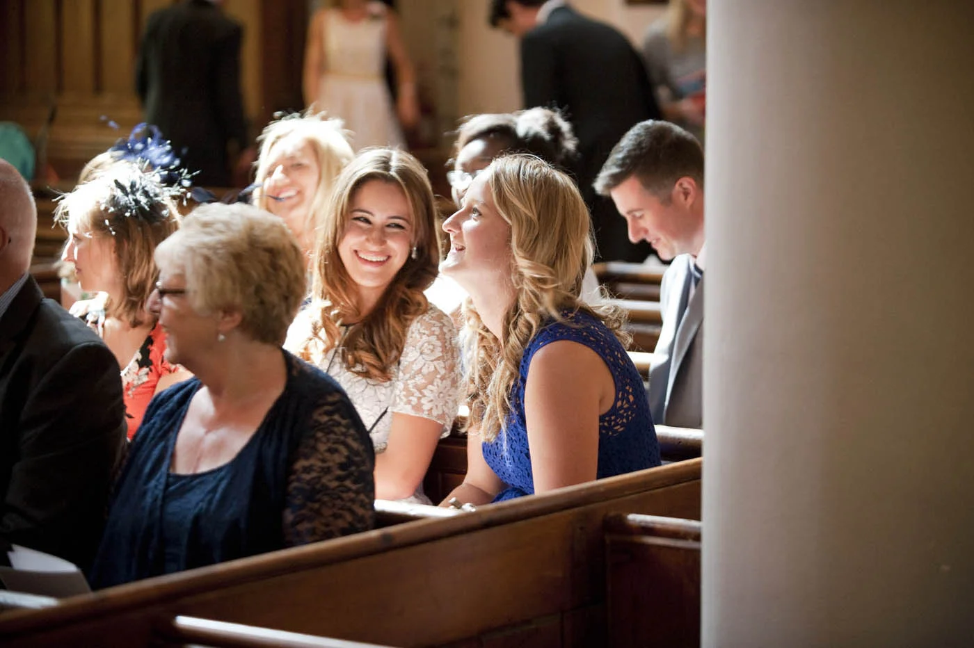 WEDDING-GUESTS-CHAT-IN-CHURCH.jpg