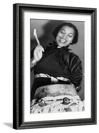 zora-neale-hurston-african-american-author-and-folklorist-beating-the-hountar-or-mama-drum-1937_u-l-q1hw0shrwngf.jpg