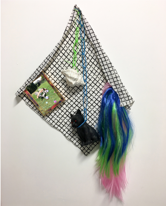 Mama's Backyard Won't Do , 2019, fabric, plastic cat, ceramic shell, synthetic wig, frame, digital photograph, push pins, zip ties, 36” x 24” x 5”