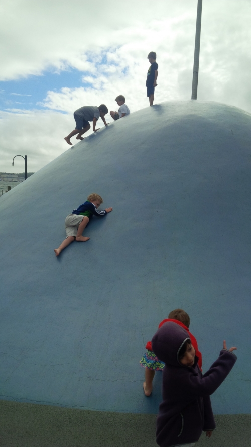 Kids play on the "wave" in Halifax. 