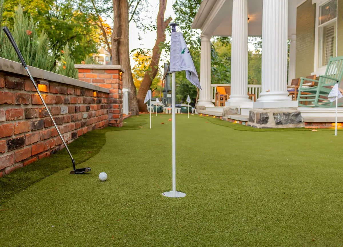 royal oak home with side lot private putting green