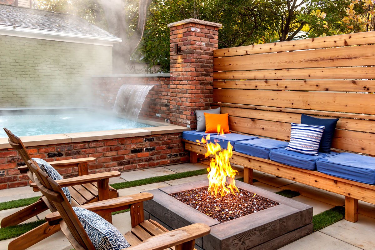 Ann Arbor property with an oversized gunite spa with a sheer decent water feature