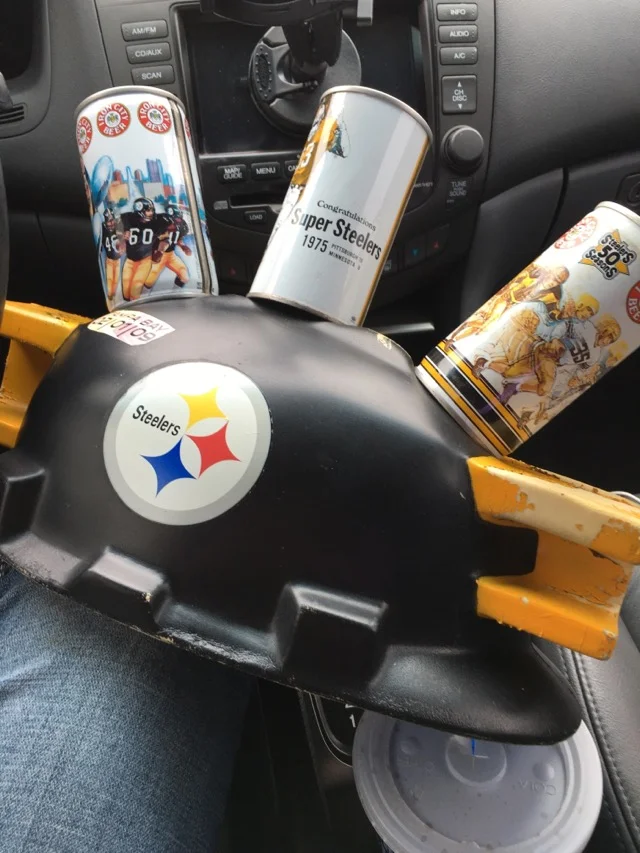 This Pittsburgh Steelers and Penguins fan has better headgear than you