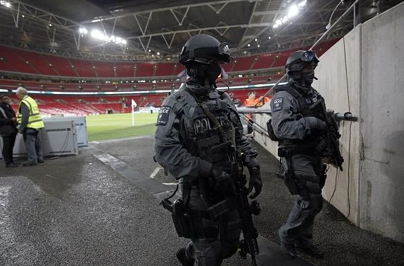 Counter terrorism specialists patrol Wembley prior to the match - shared on fancred by landon howell