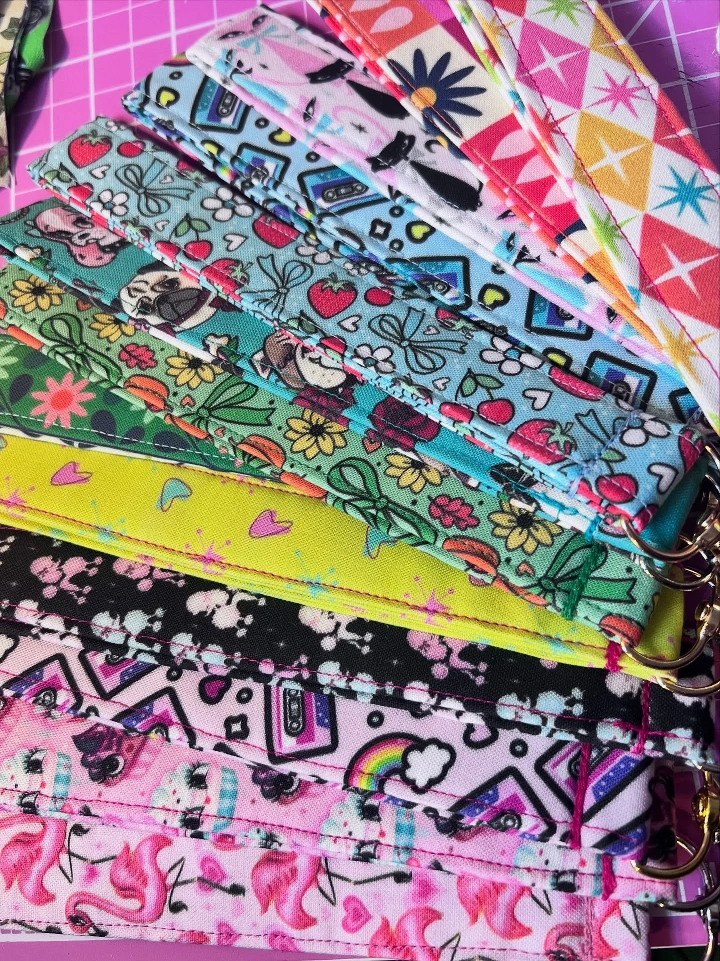 View from the workspace! Coming along to Del Ray Vintage &amp; Flea next week, these keychain wristlets are reinforced and heavy duty in the cuuuuuuutest patterns! Snag one for you &amp; and a friend! 💙💚🩷