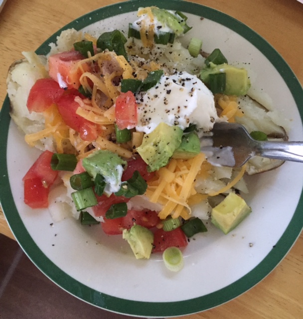 This is about as fancy as i get around here: baked potato with fixings.