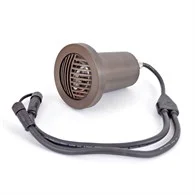 Coastal Source solid brass well light for in-grade uplighting on a Hamptons landscape