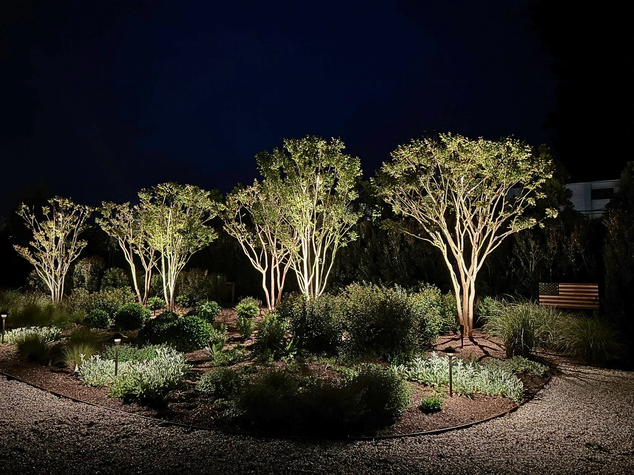 garden bed, landscape lighting, amerian flag