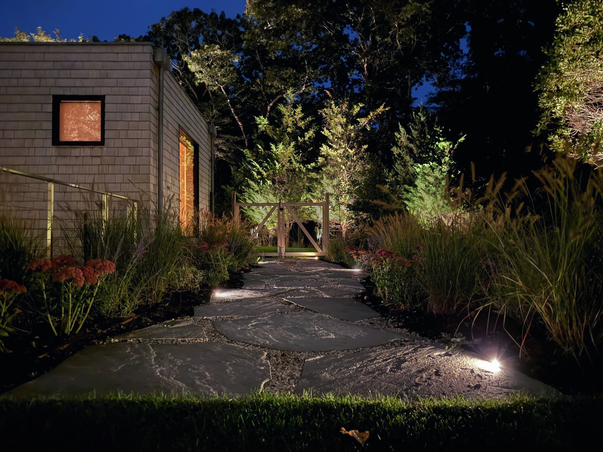 Coastal-grade pathway lighting installed on an East End property