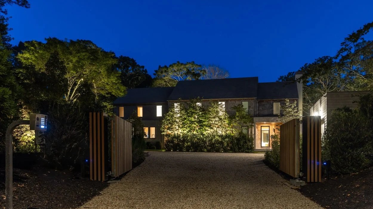 Layered landscape lighting design at a Southampton home