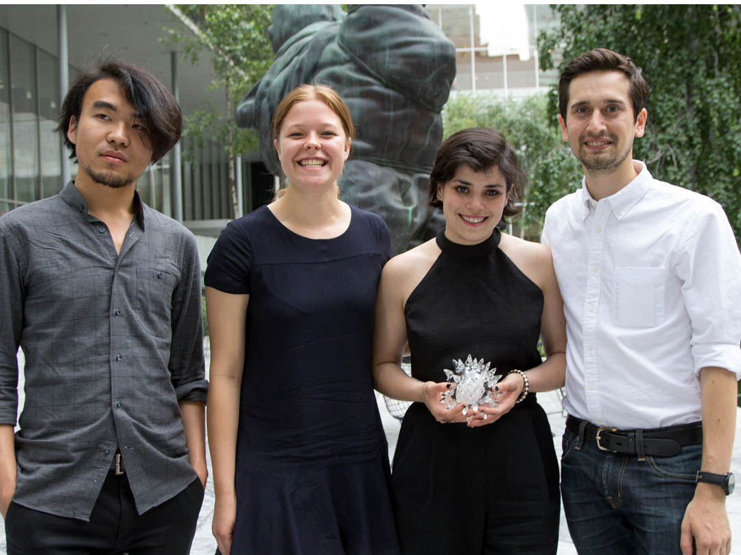 The Team: Gian Cui, Aleksandra Gosiewski, Tessa Callaghan and Aaron Nesser. Advisers (not pictured): Asta Skocir, T heanne Schiros, Sass Brown, CJ Yeh. Image via The Fashion Institute of Technology. 