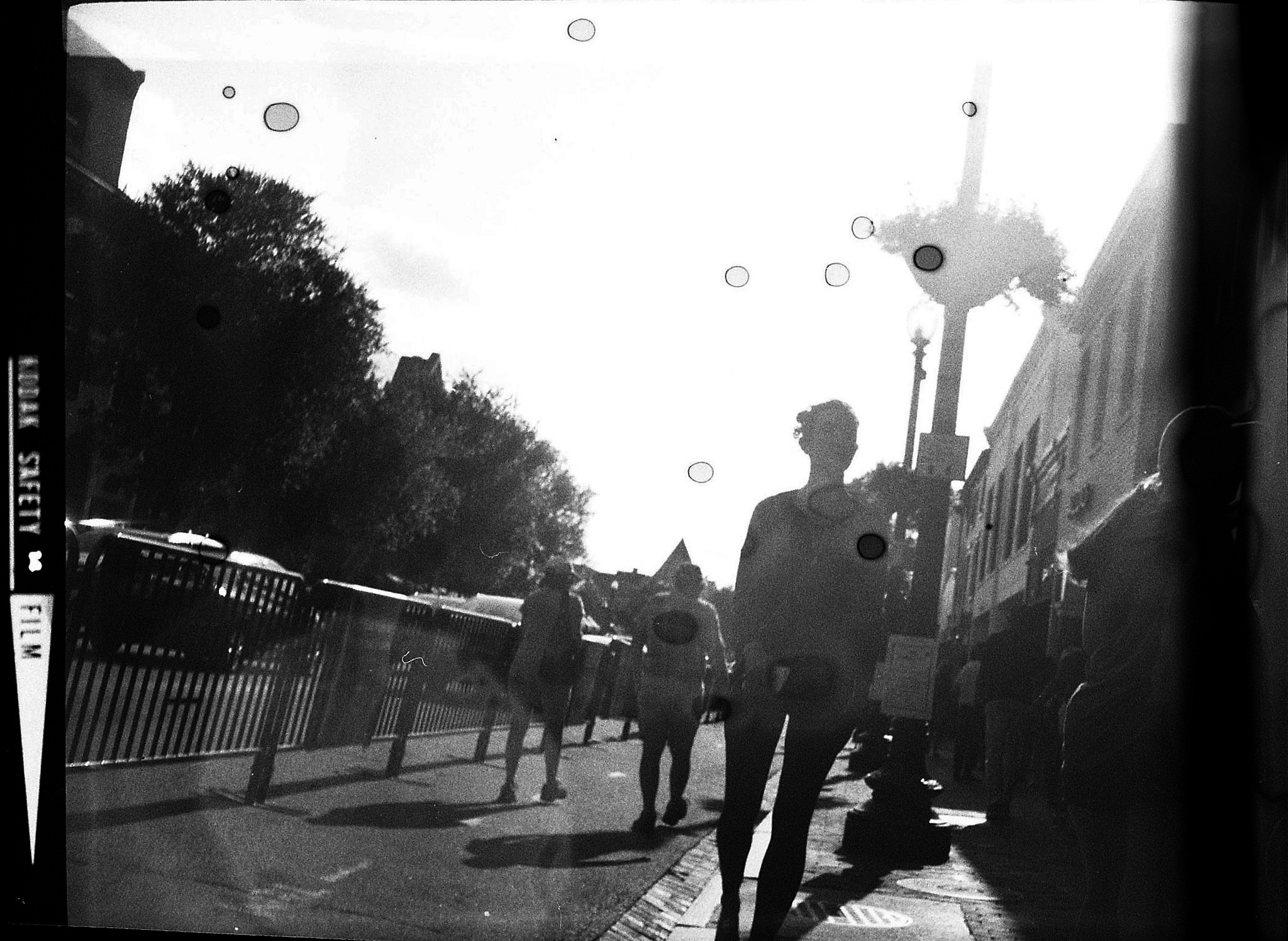 M Street in DC's tony Georgetown neighborhood. It was called safety film because it was made of cellulose acetate, as opposed to the nitrate films from earlier in the century which would start a house fire the second you looked at it wrong.