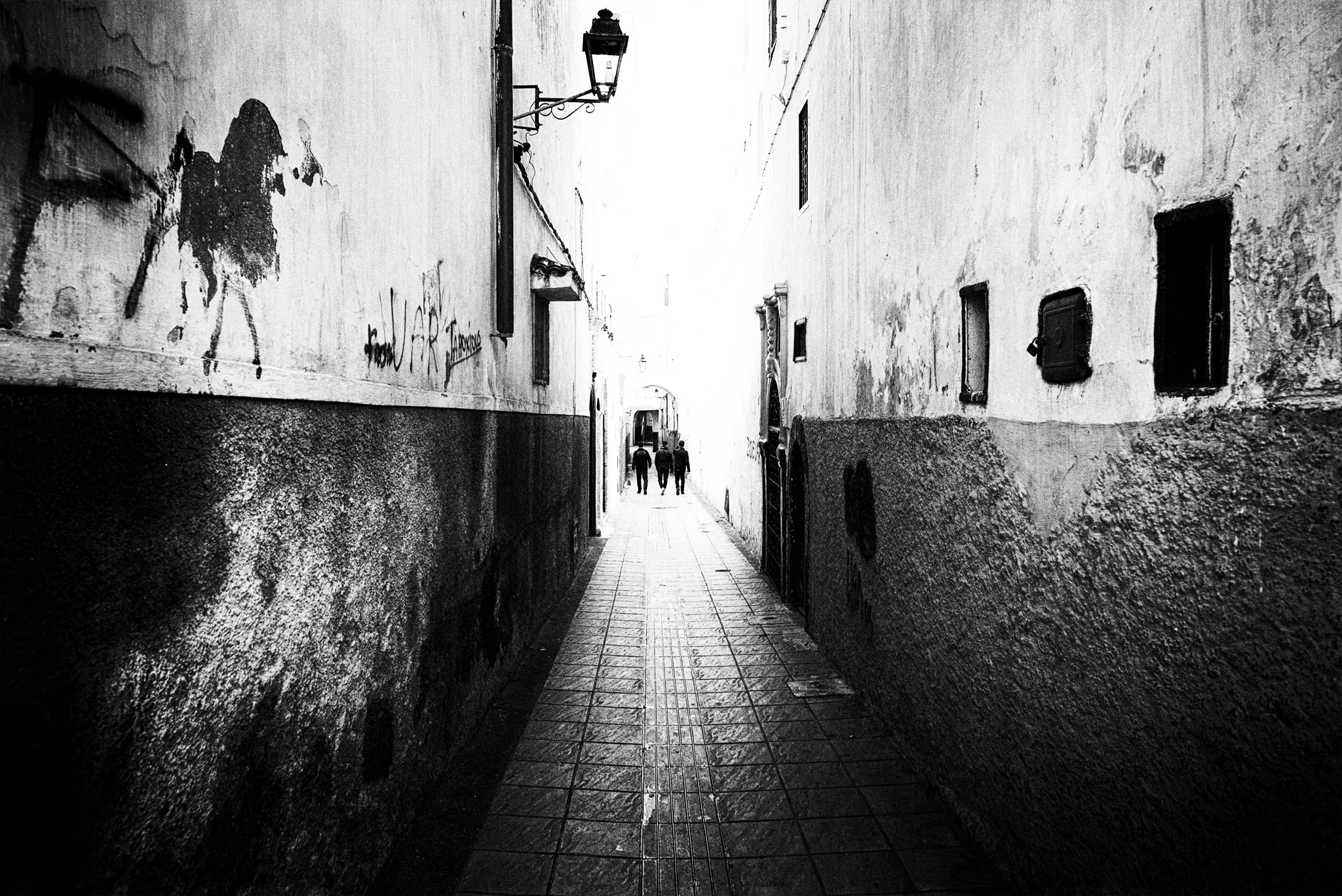 f/6.3, 1/400th shutter, and ISO 400. Lots of contrast added in the edit, with some added vignetting as well.