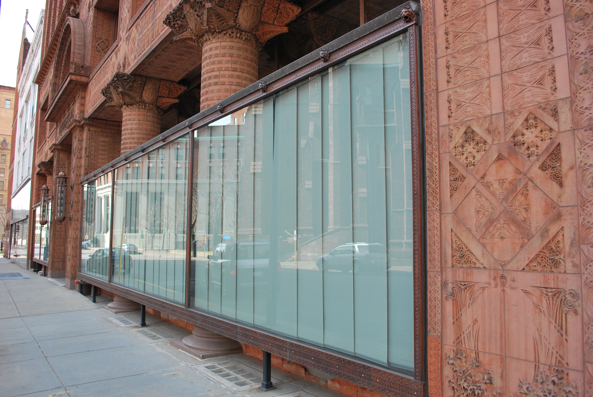 New cast bronze framing installed around storefront windows