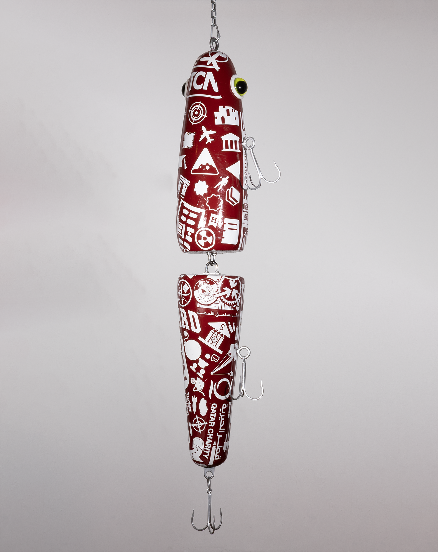  LURE  HARVARD x QATAR x IRGC&nbsp;  (MAROON &amp; WHITE)  HOOK LINE AND SINK HER  The Luring Test SERIES  84 × 12 × 12 in.  EPS foam, boat bondo,&nbsp;  vinyl, custom trebles,&nbsp;  spray paint, eyelets,&nbsp;  custom epoxy resin, fish&nbsp;  eyes,