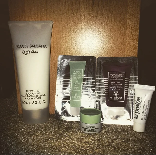 Dolce & Gabbana Light Blue  Refreshing Body Cream, Sisley Eye Contour Mask, Sisley Black Rose Cream Mask, La Prairie Cellular Radiance Eye Cream, and Clinique Repairwear Laser Focus Eye Cream.