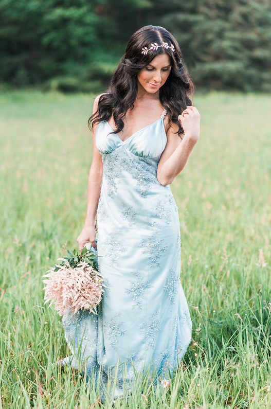 Flowers by Forth Floral Custom Wedding Dress by Mink Maids The Bride If you don't' see yourself as the "traditional bride" then opt for a different color than white. Choosing a light pastel color for your wedding dress is very fashion forward right now and looks beautiful! If you don't want to go to that extent then choose a glam headpiece over your classic veil. 