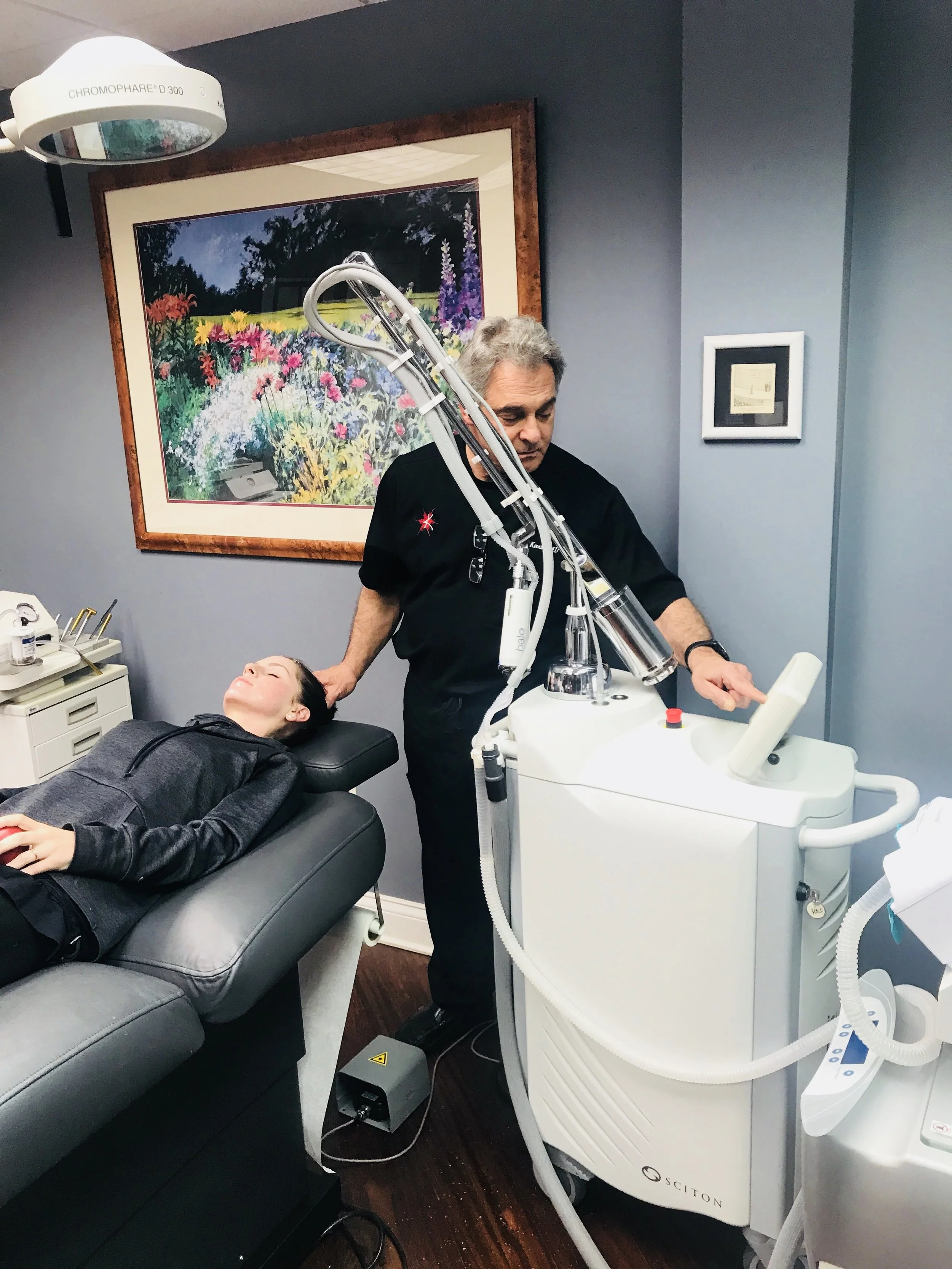 45 minutes or so later here we are in the room to start the laser! At this point I am a bit nervous as I have heard from people that have received laser treatments from other places in the past that it can be painful. But the good news is, I can't feel my face at all right now so that is promising to avoid any pain! Dr. Kovak starts the treatment on my face making sure that I don't want any numbing shots and with declining them we move forward. You guys, I literally felt NOTHING! No pain, no stinging or anything through the short 15-20 minute process.