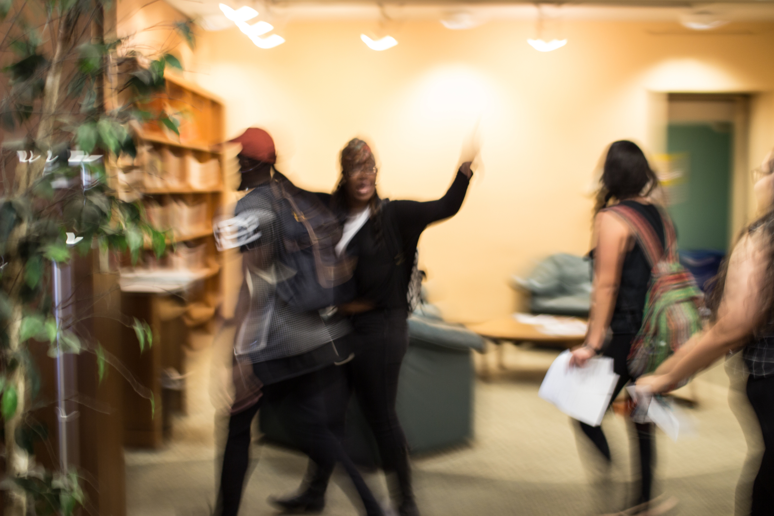 Student activists from ‘Oxy United for Black Liberation’ march into Occidental College's library to commence the campus wide ‘walk out’ from classes and academic buildings on Nov. 12th, 2015