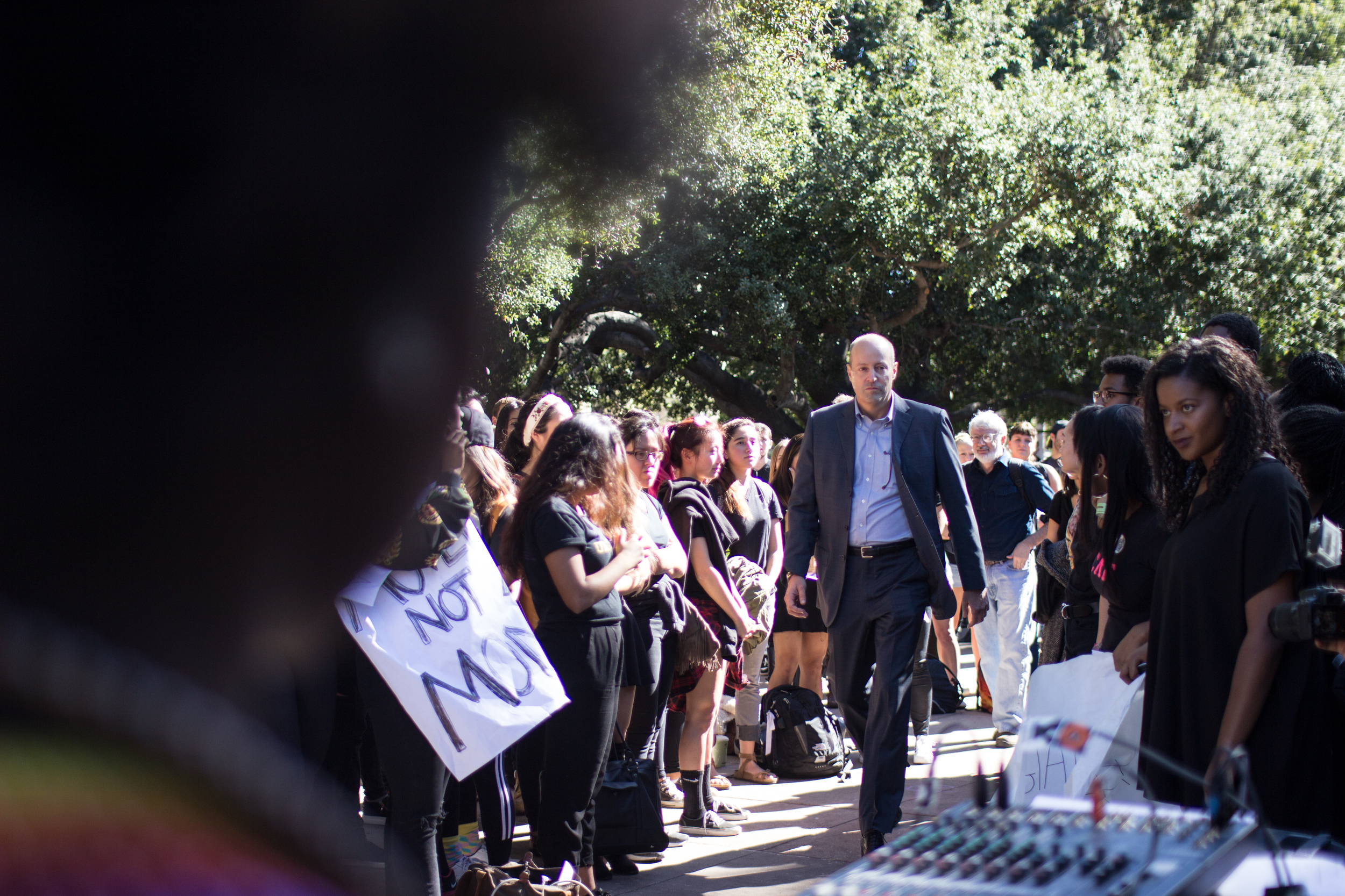 Occidental College President Jonathan Veitch walks into the student protest after having his presence at the rally announced by the movement organizers.