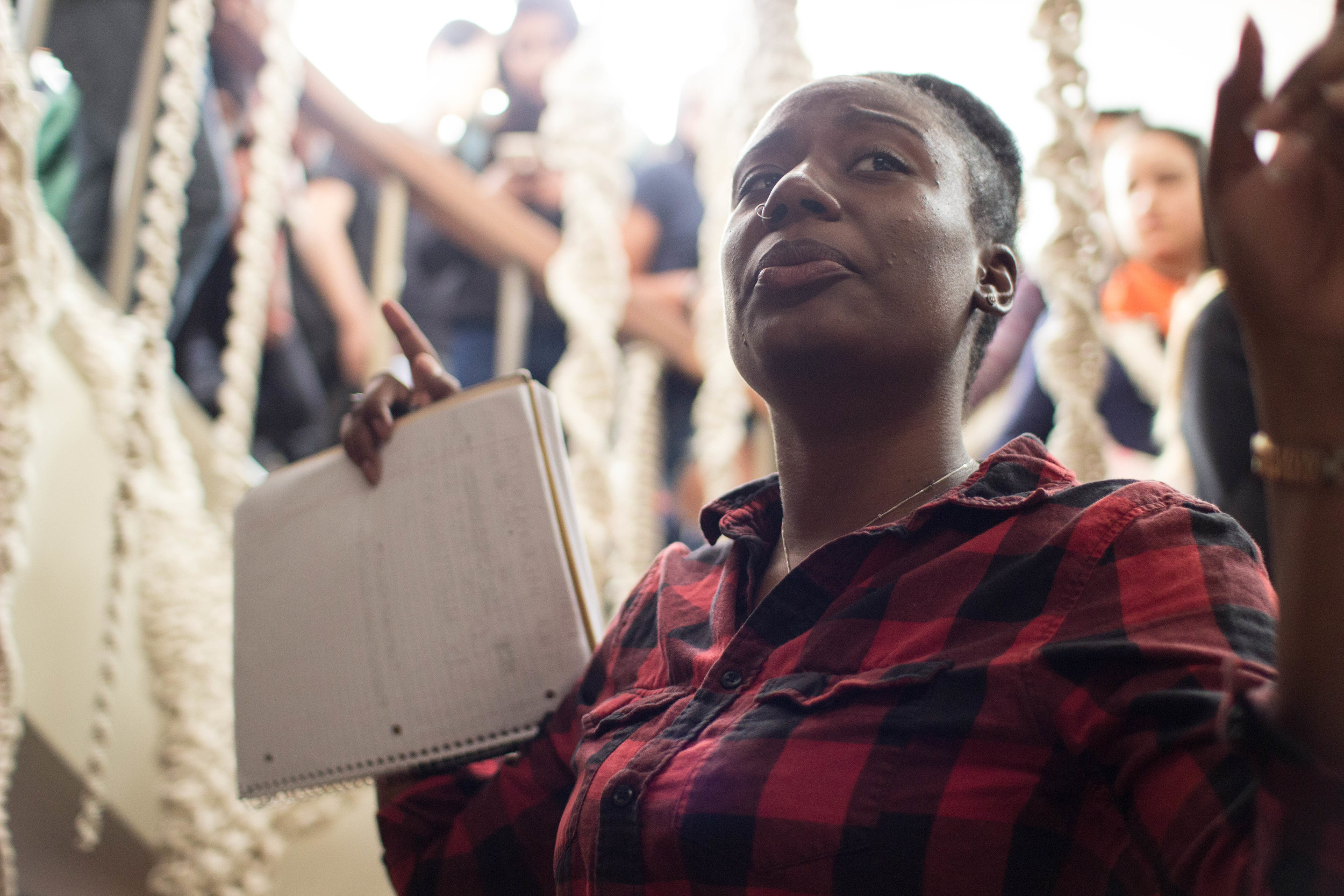 Organizer Diamond Webb directs activists to occupy the remaining administrative offices on the second day of the protest. 