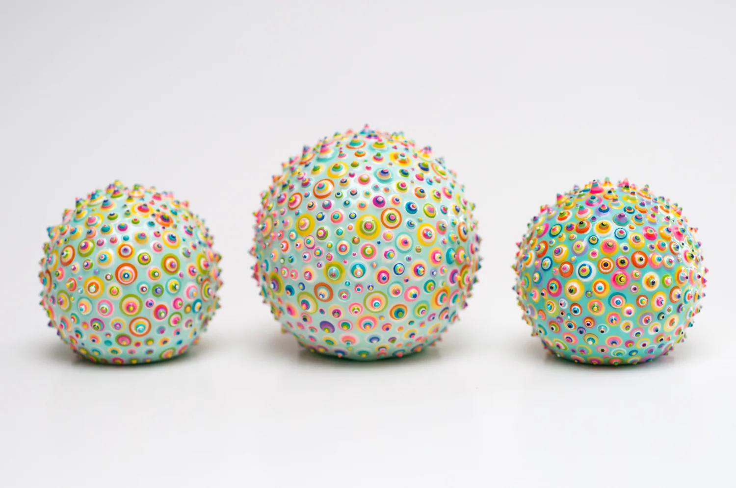 Bindu Terra. 2", 2-1/2". Acrylic and resin on wood. 2015.