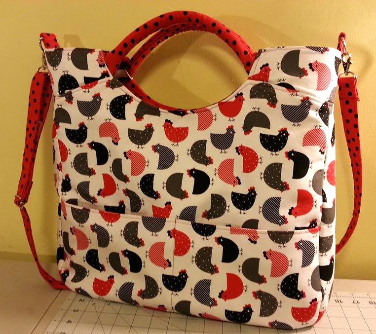 Part WEEKENDER, part TOTE...designed and sized to be the perfect daily companion. Daytripper (large size) City Tote. Measures 15" high, 17" wide, and 5" deep. 
