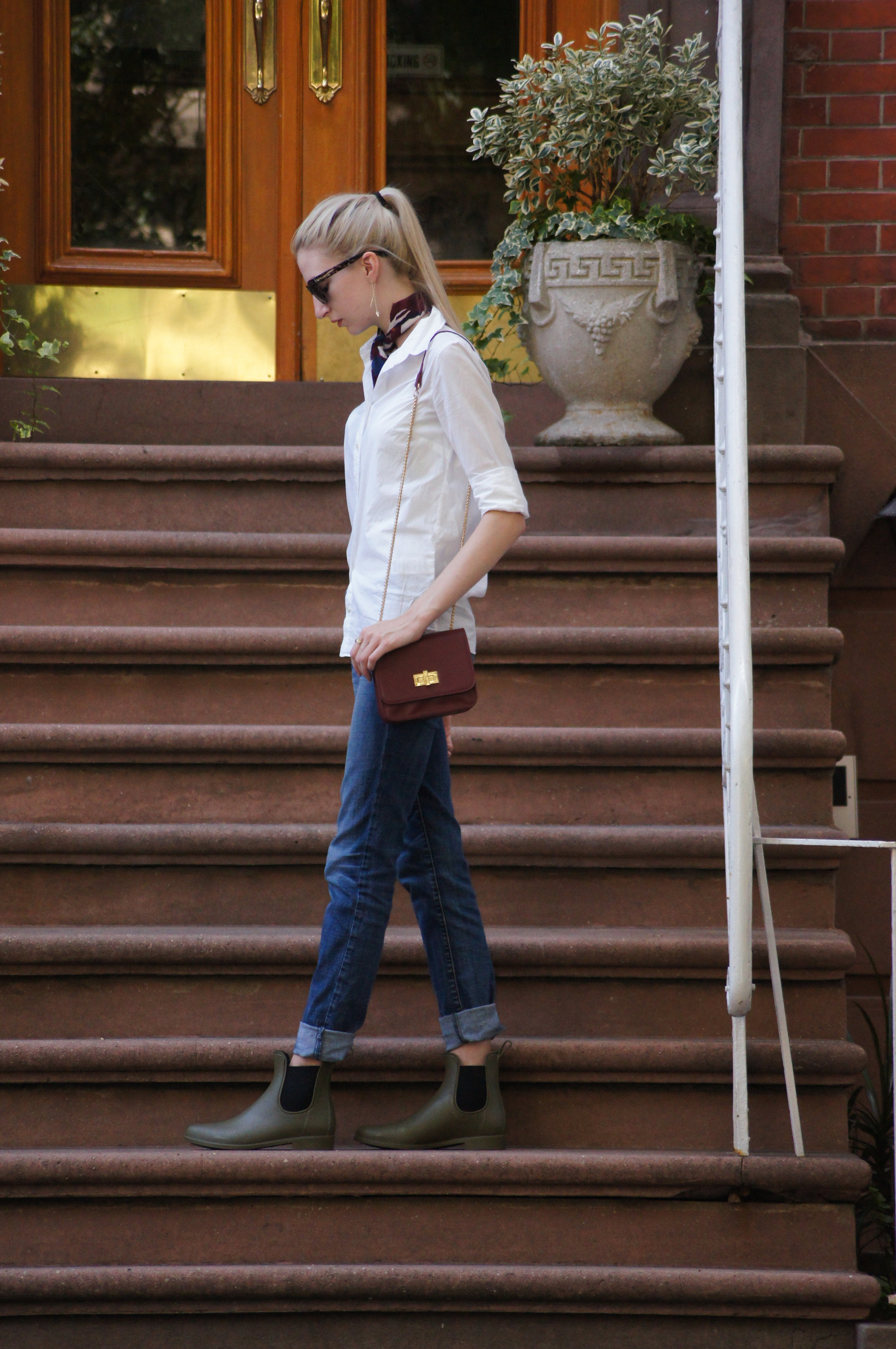 J.Crew white perfect shirt and wilderness knot tied neck scarf, american eagle relaxed jeans, J.Crew matte chelsea rain boots in olive green, LOFT oversized sunglasses, Kendra Scott elisia drusy necklace and kimmel threader earrings, whowhatwear mic…