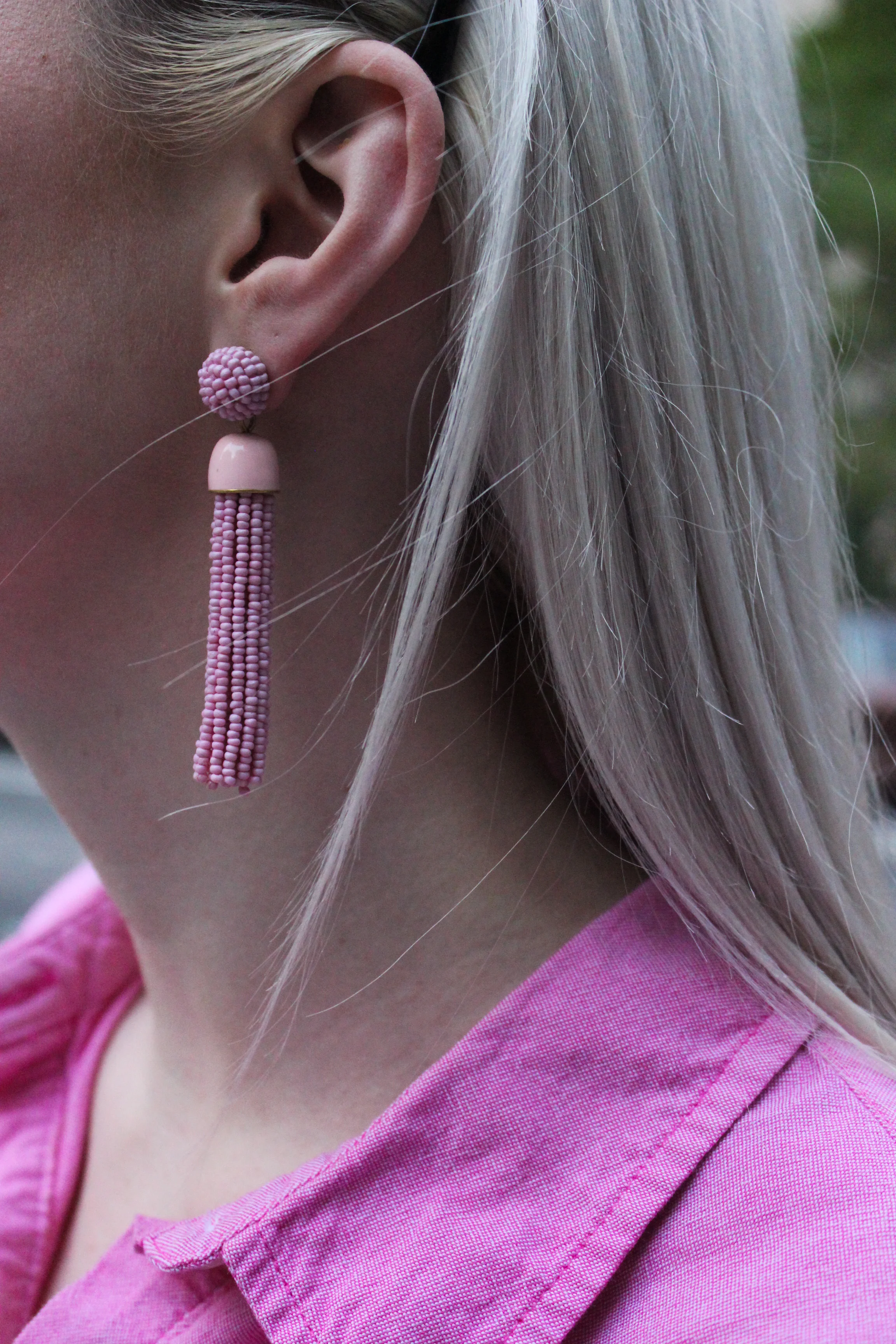 J.Crew hot pink bow tie shorts, pink button down, heeled sandals, and tassel earrings. All pink monochrome outfit. elle woods style