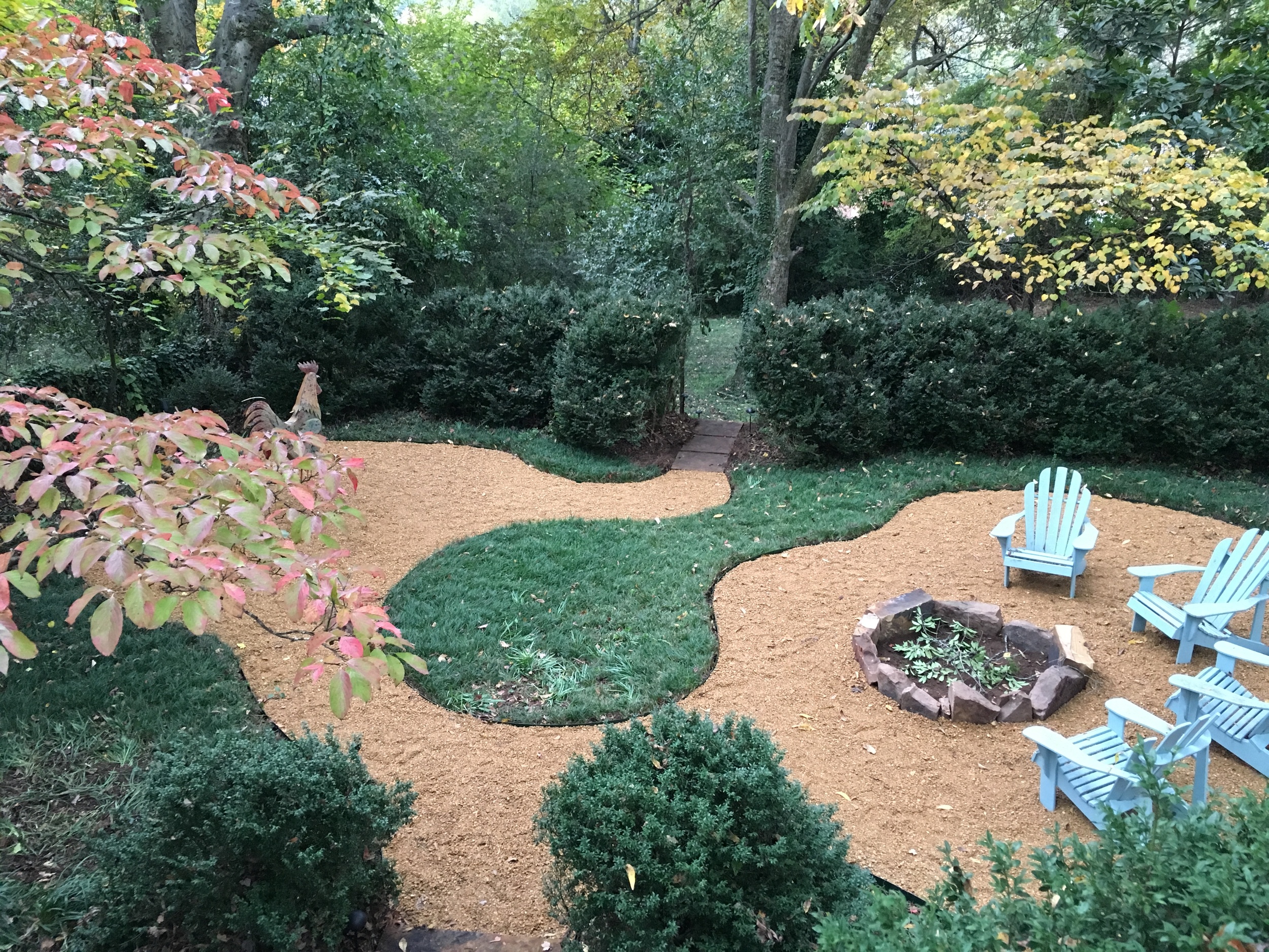 The hardscaping is complete, but we still need to plant flowers and clean up the hedges.