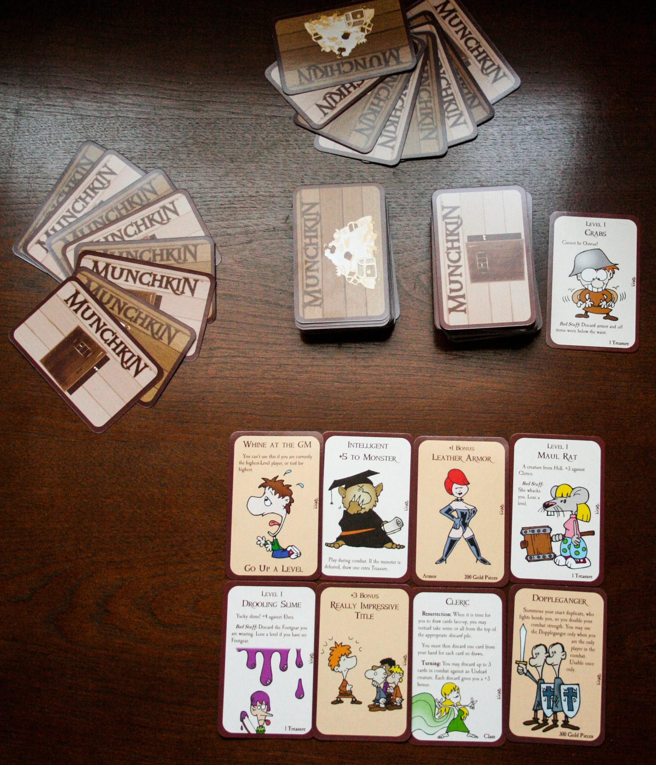 Here is an example of a game setup. each player starts out with 8 cards, but by the end of your turn, you can only have 5 in your hand. i am showing you "my" hand here, so you can see the types of cards that will be in your hand.