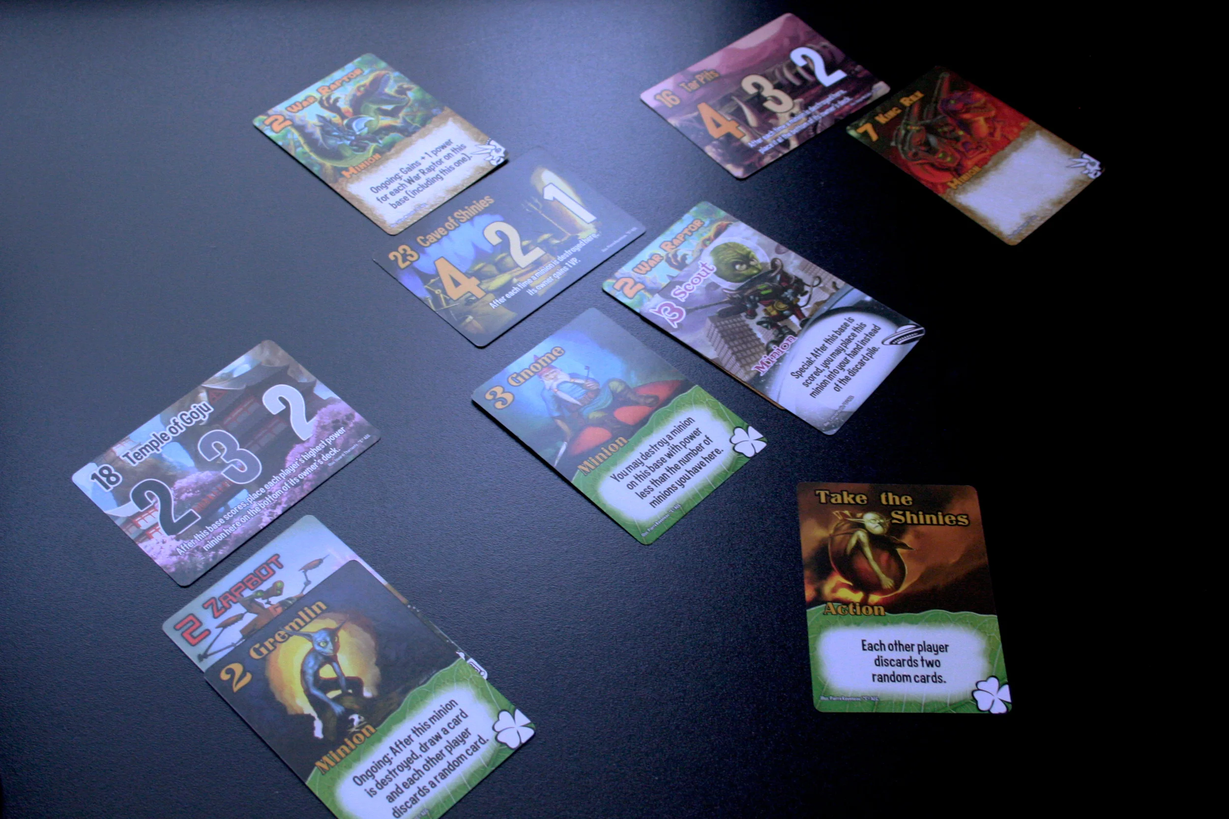 Players play minions and actions to get ahead and break each Base's breaking point number (in the top left on the Base card).