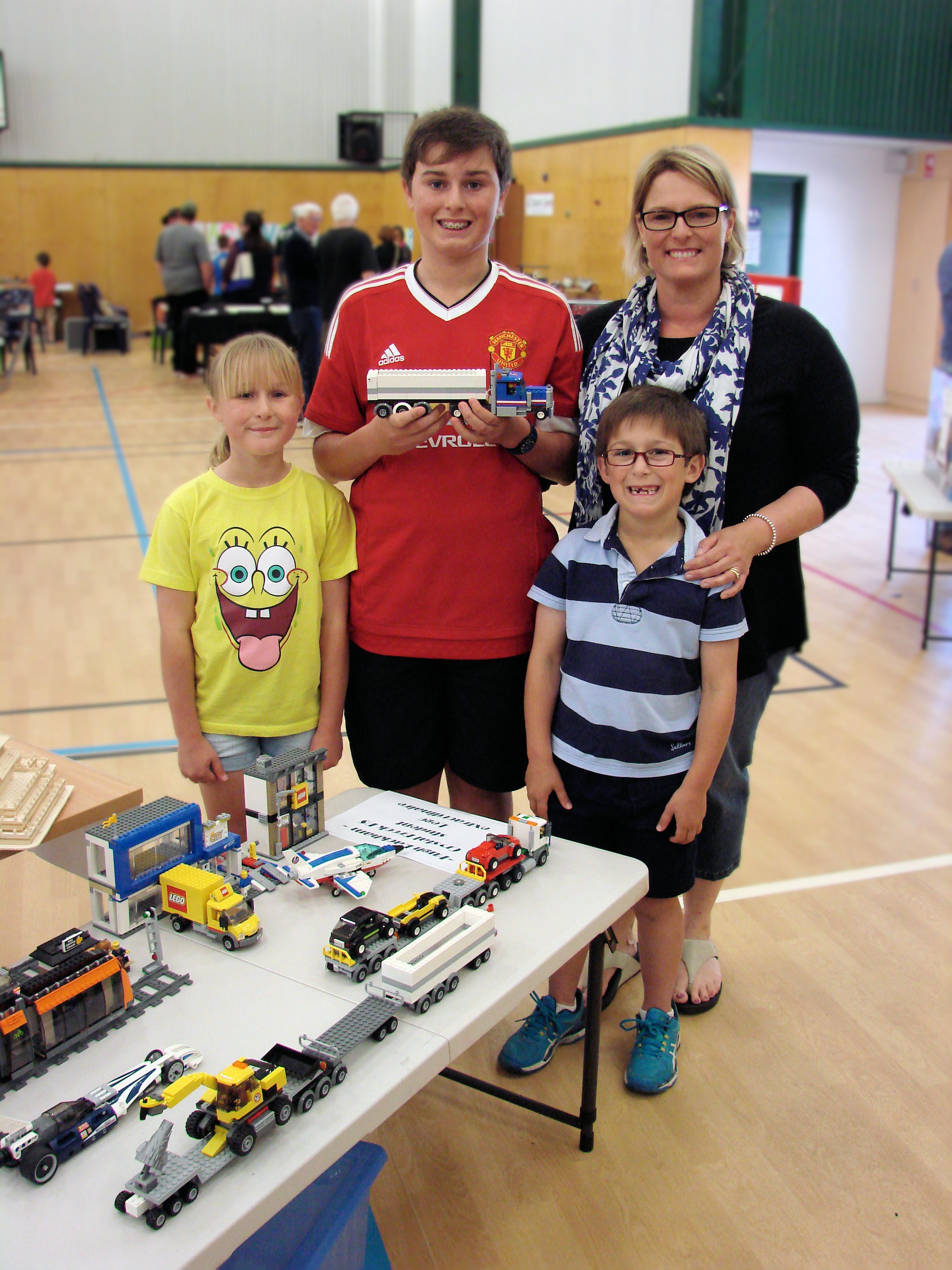 Left to right: Laura, Hugh, Julie and George Rackham with the Lego Models that Hugh made for the Model Railway and Hobby Show.