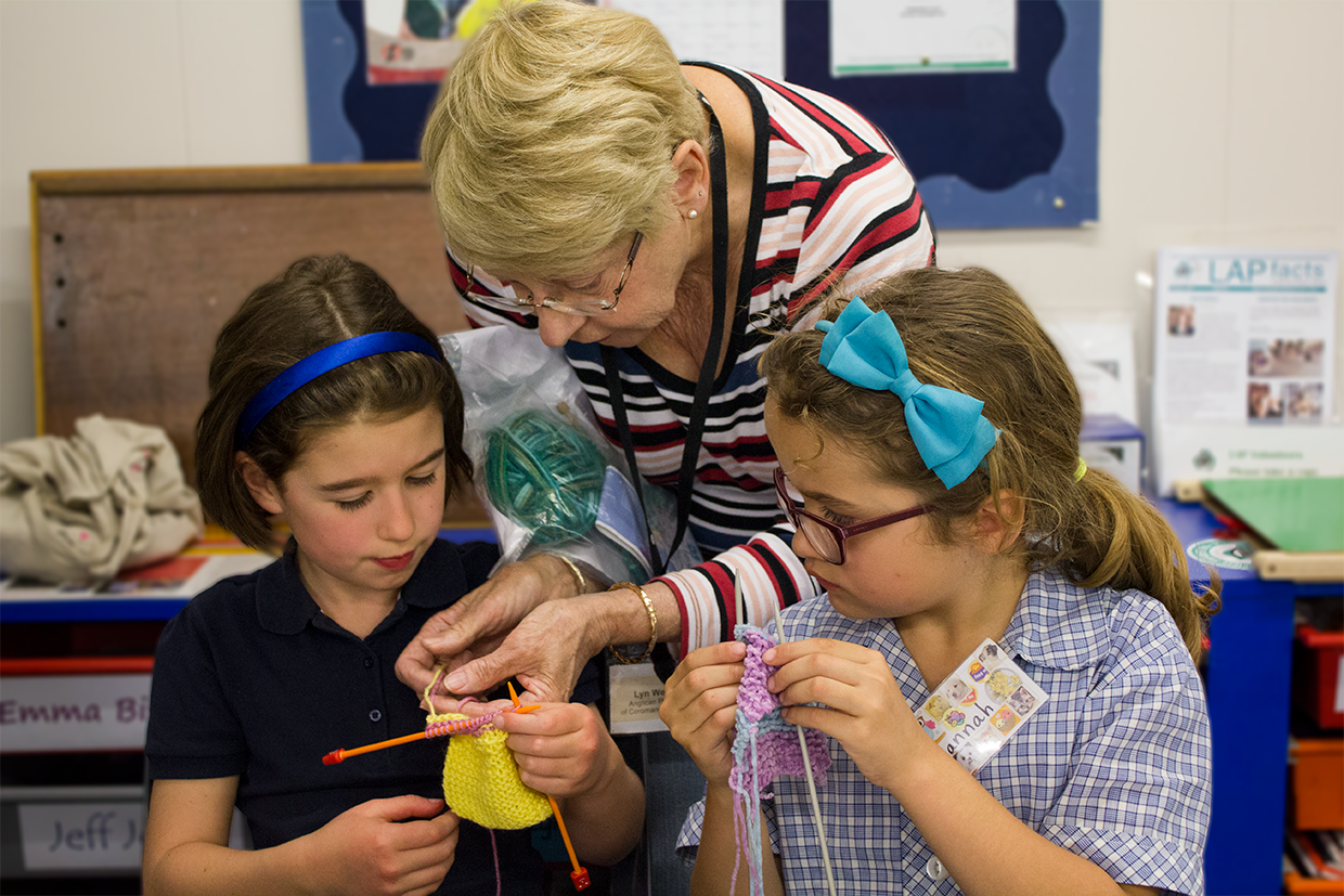 above: Volunteer Lynn Wells with students Emer and Hannah