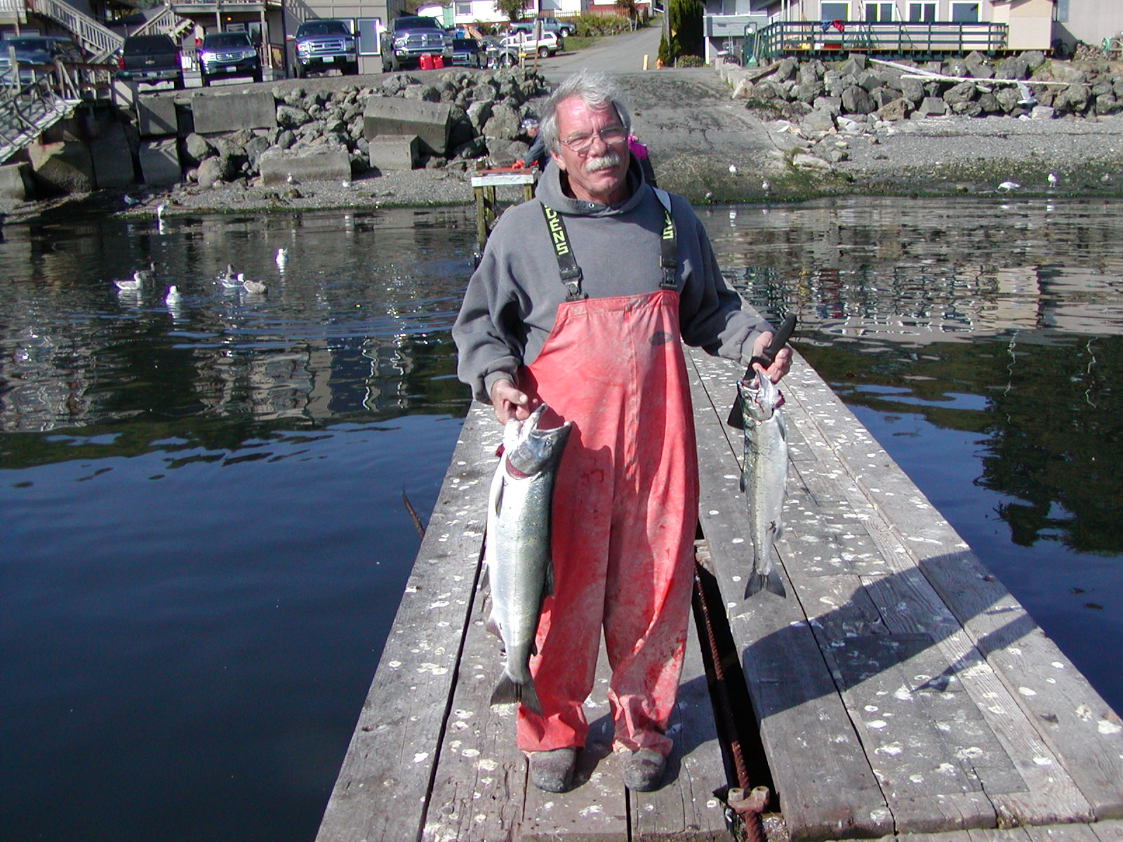 PJ two salmon on dock.JPG