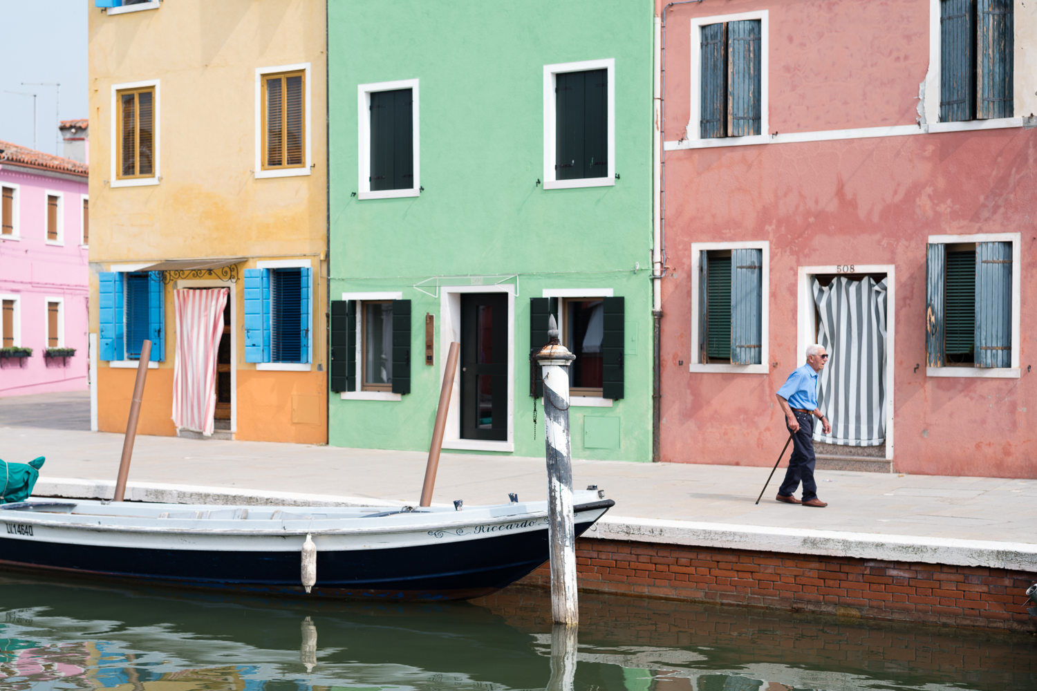   Burano color palette + wandering man     Leica M10 1/1000s F2 ISO100  