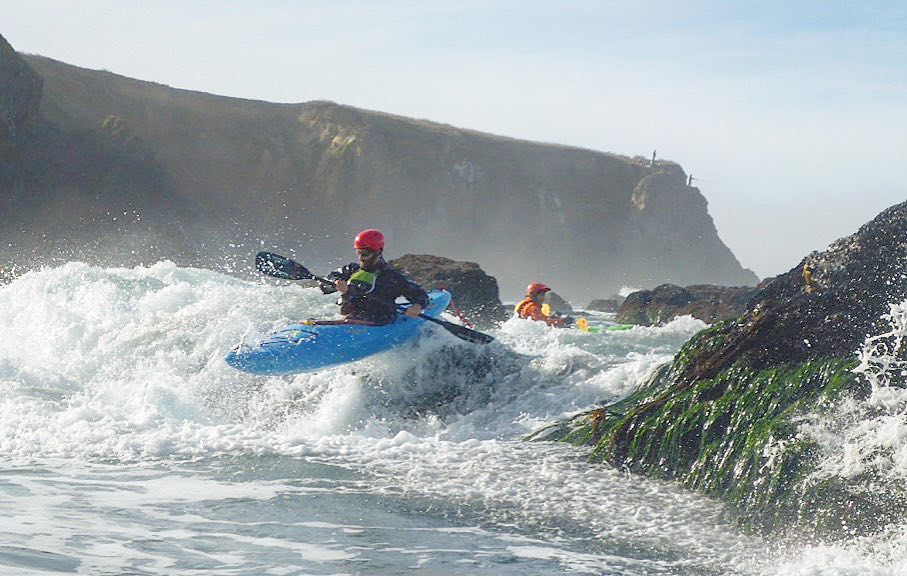  LFK's Jeff Laxier demonstrates a whitewater kayak boof stroke in the ocean. 