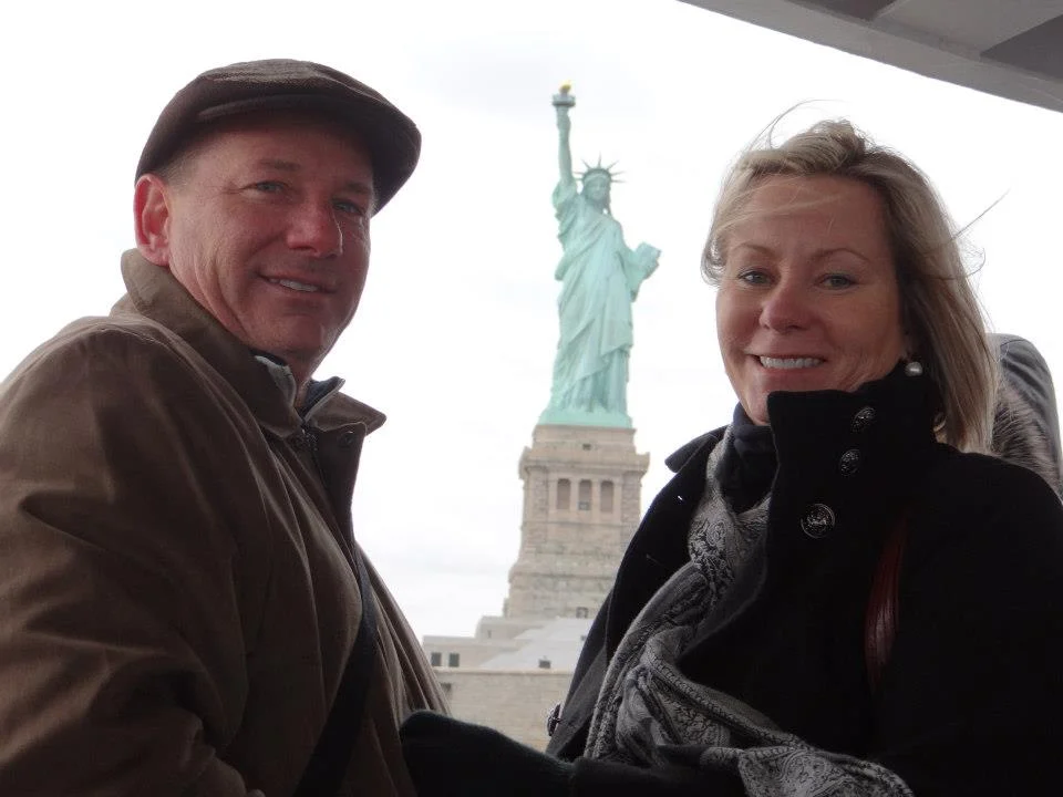 mom + dad at the statue of liberty