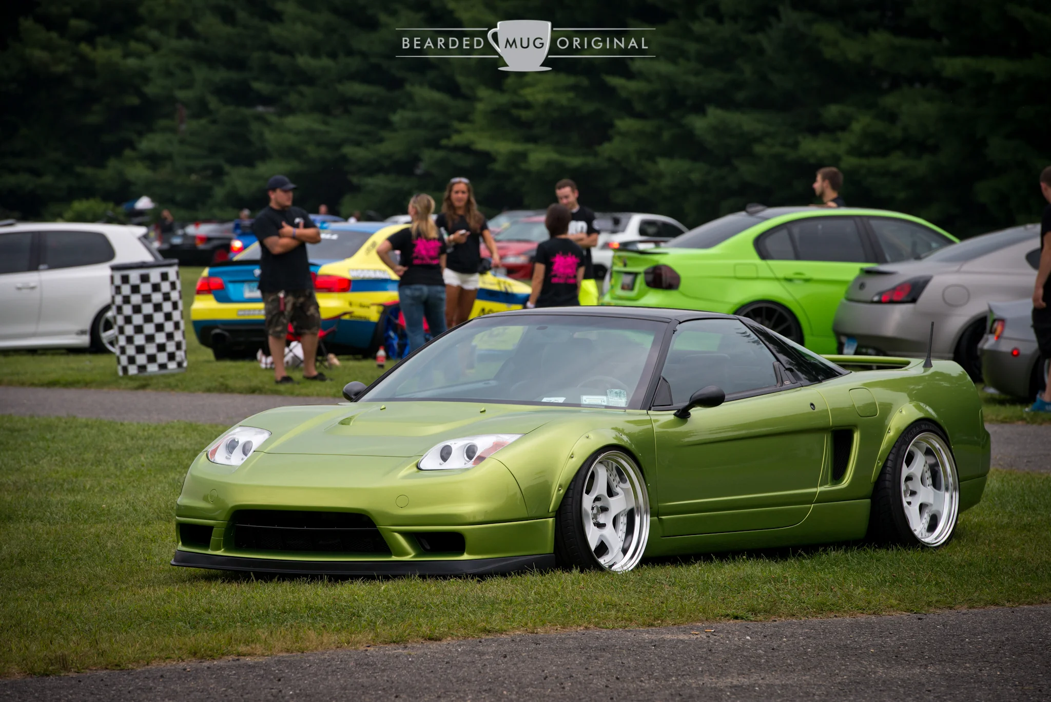 It's not everyday that you see Acura's flagship done up in this manner. Although it's not for everyone's tastes, the combination of the bolt-on flares, ground-kissing stance, and those wheels work well with that color. 