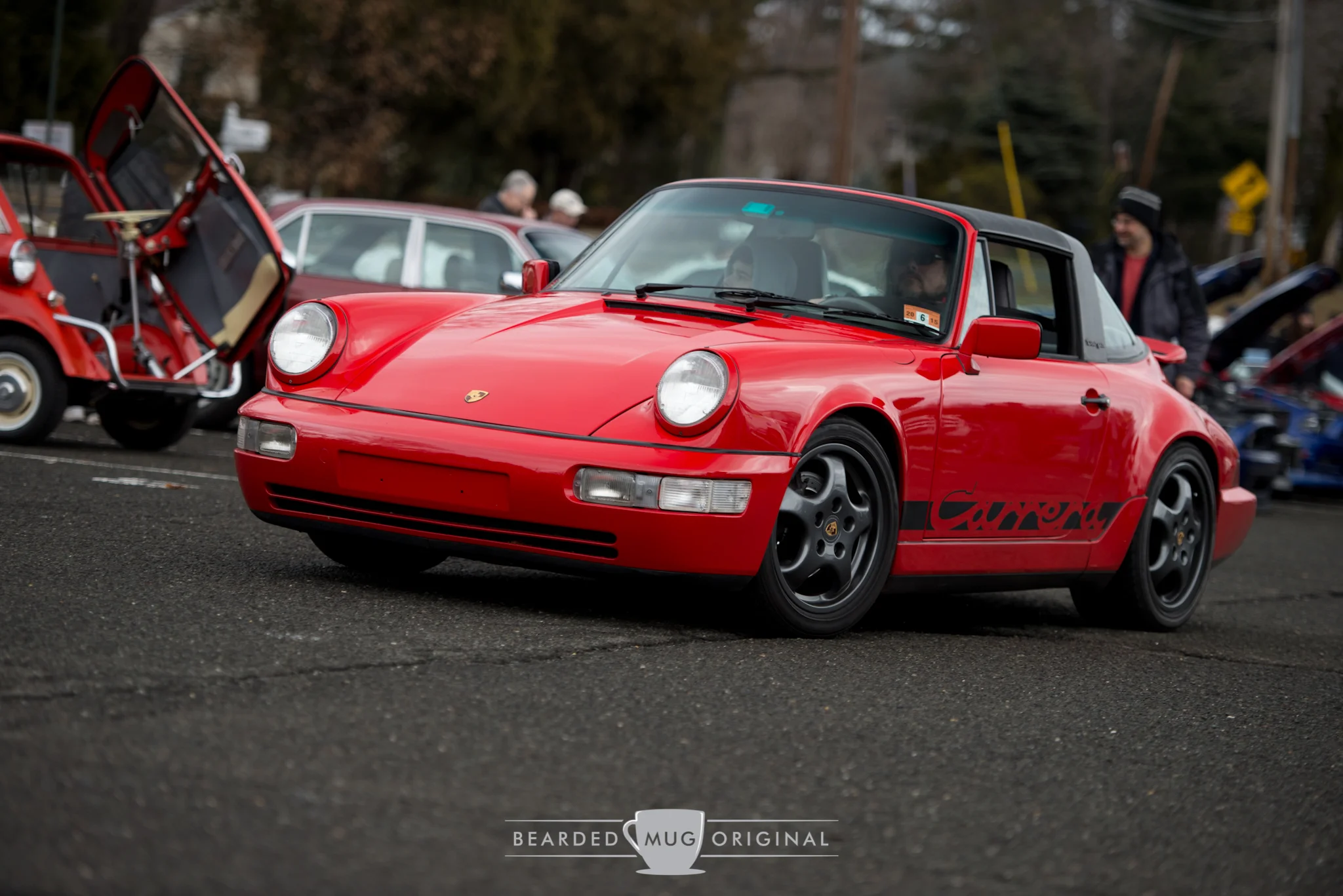 Jose and his minimally modified Guards Red 964 Carrera 2 Targa as seen leaving the lot.