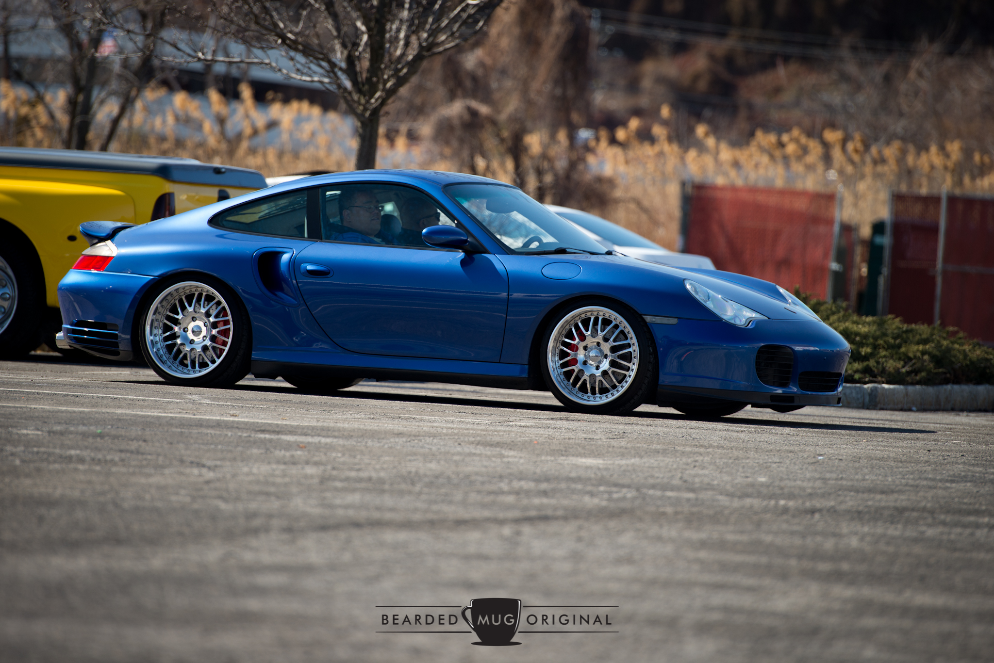 Although I prefer the stock Turbo twists, you can't argue that a nice set of aftermarket alloys can enhance the look of your ride. Especially if it's painted Cobalt blue.