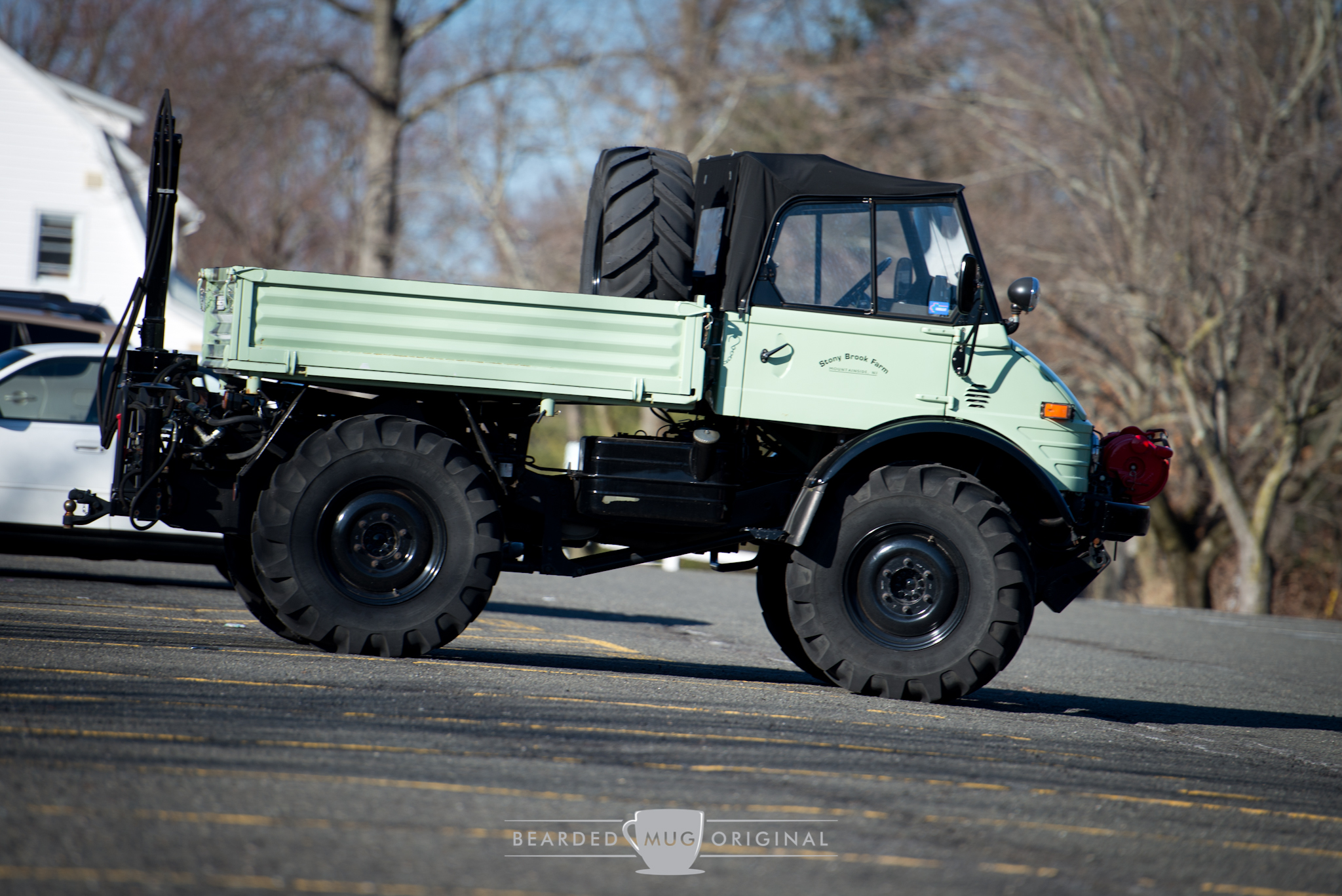 This Unimog, brought by Stony Brook Farm, is outfitted with everything that makes the Unimog badass; giant knobby tires with a spare, winch, canvas top, snorkel (not pictured), and some sort of hydraulic attachment on the rear.