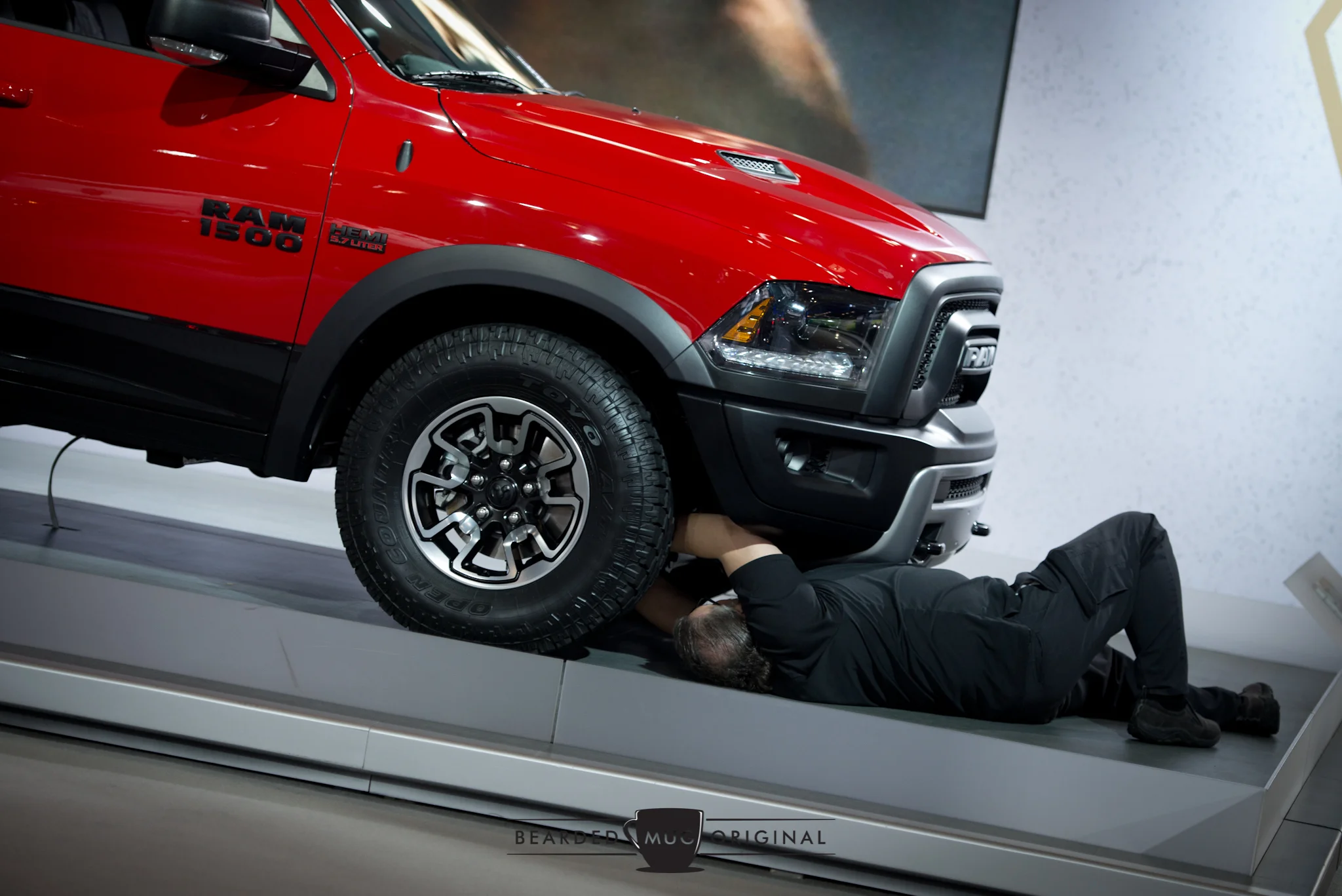 I'm sure whatever he's doing would have been easier with a pit or a lift, both of which were not an option.