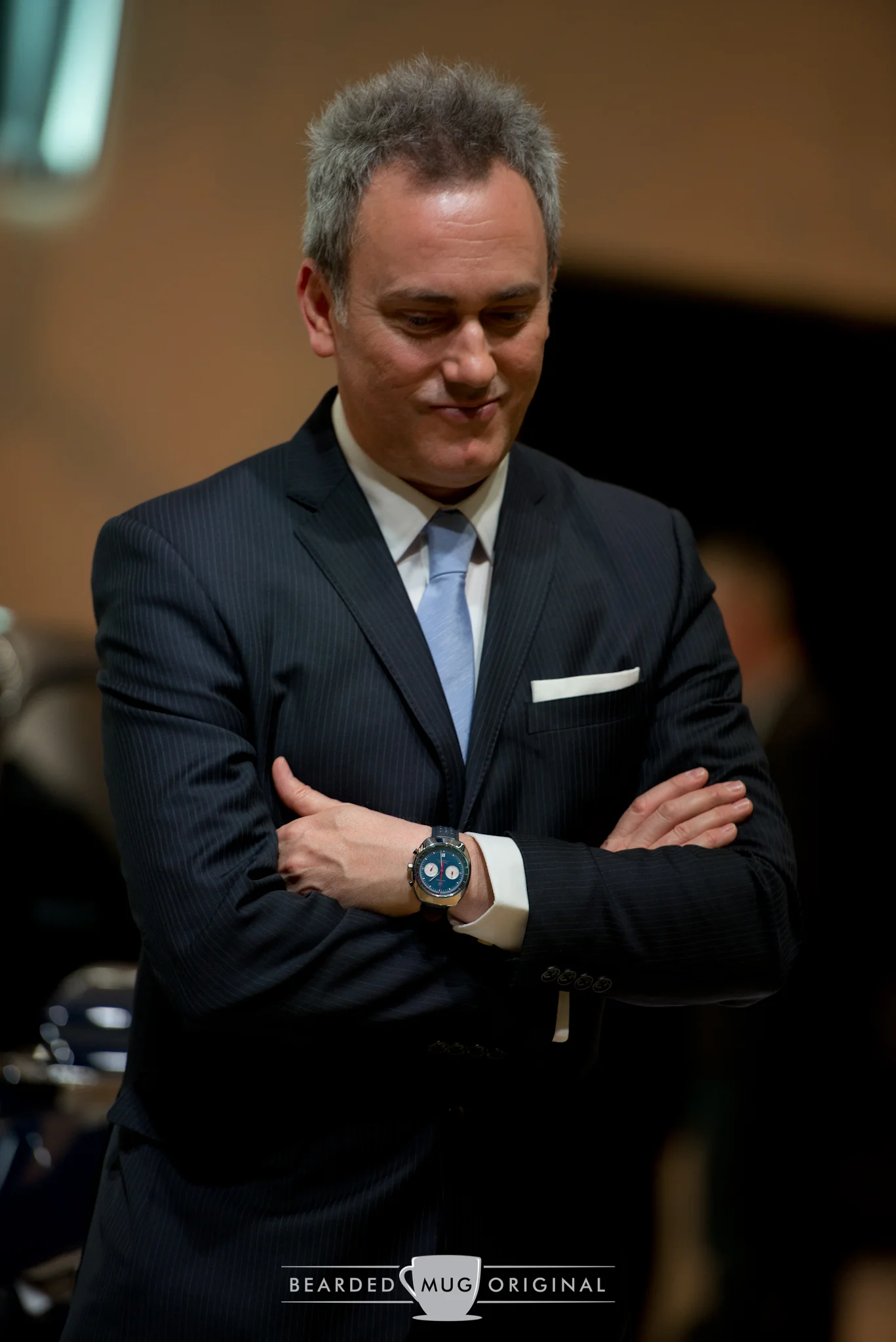 Lincoln's David Woodhouse stands in his signature pose in front of his Continental concept.