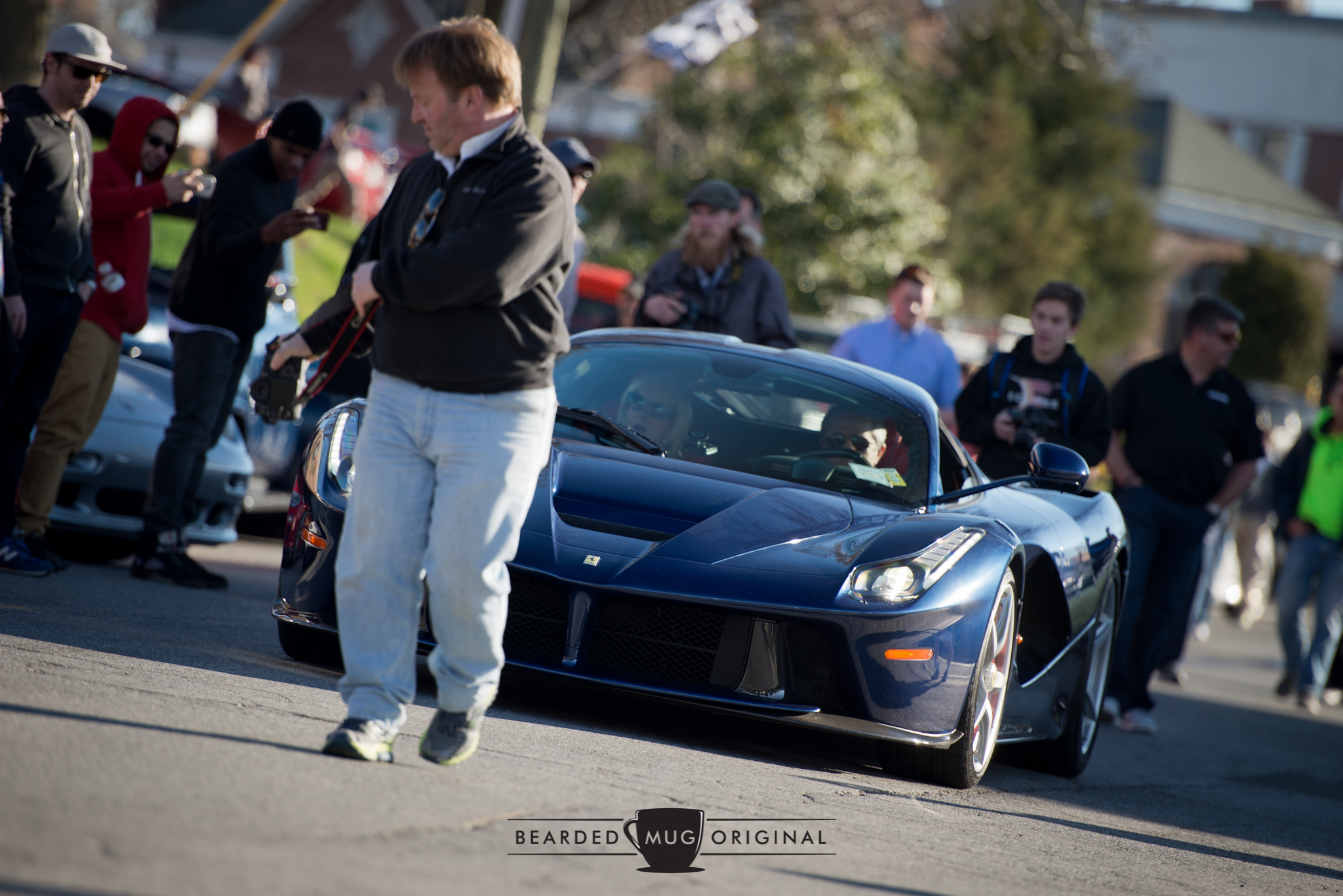 The TdF blue LaFerrari was escorted down Pine St. by C&C's own Todd Brown, leaving a trail of photographers in its wake.